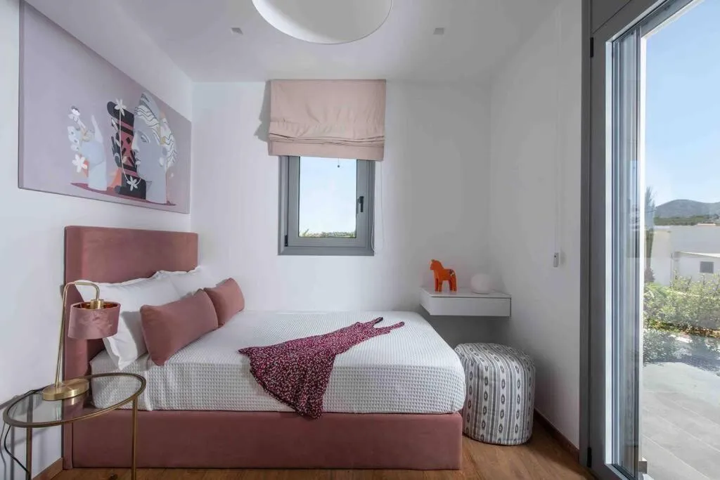 Bedroom in Opsis Luxury Villa with swimming pool