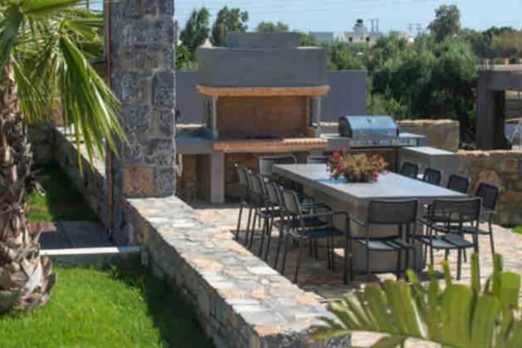 BBQ facilities in Opsis Luxury Villa with swimming pool