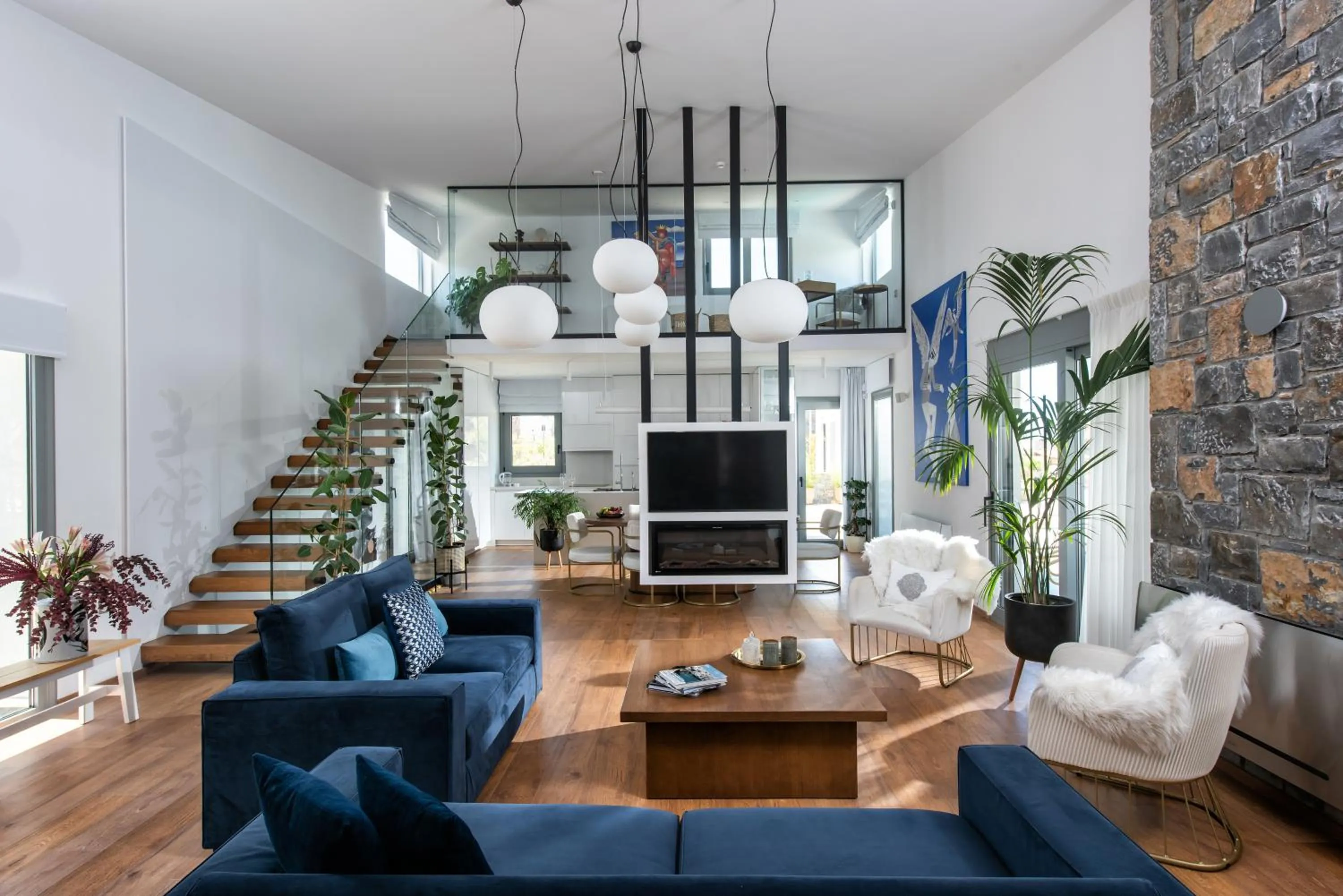 Seating area in Opsis Luxury Villa with swimming pool