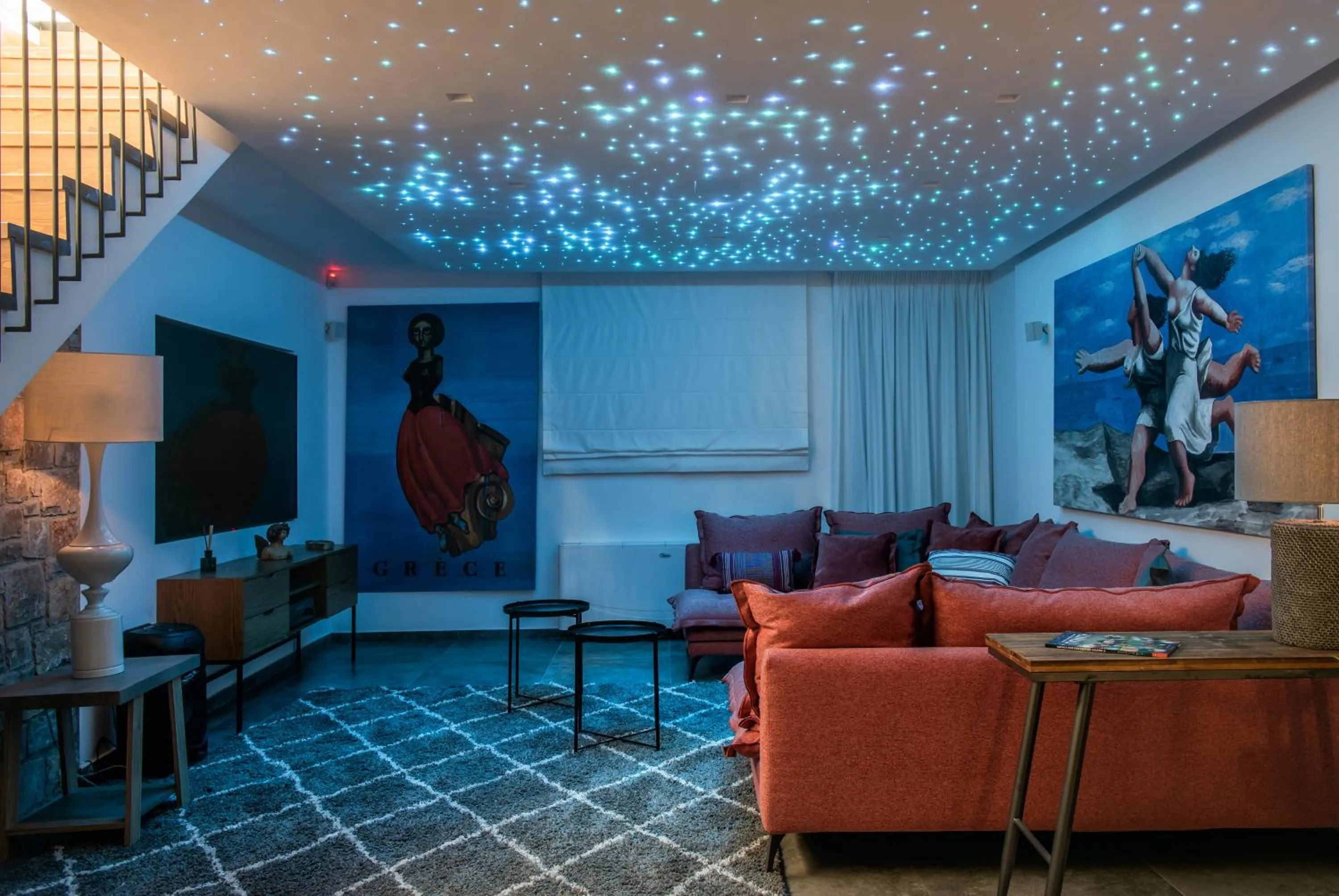 Communal lounge/ TV room in Opsis Luxury Villa with swimming pool