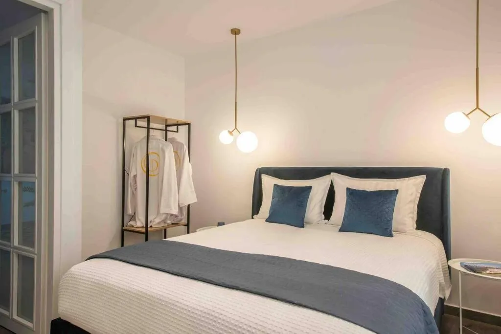 Bedroom in Opsis Luxury Villa with swimming pool