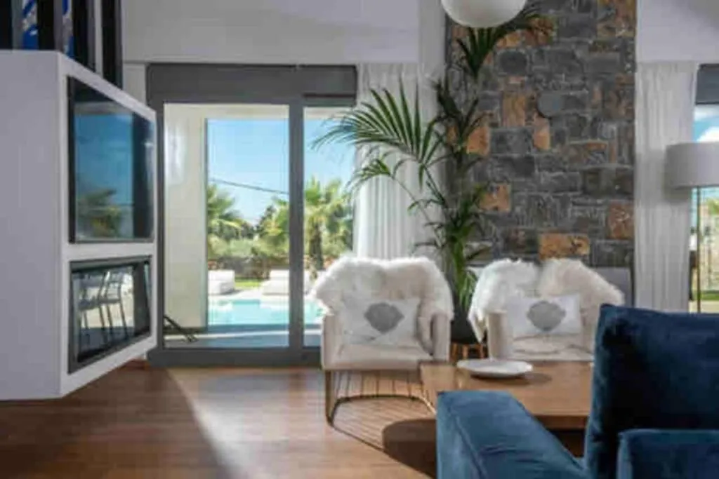 Living room in Opsis Luxury Villa with swimming pool