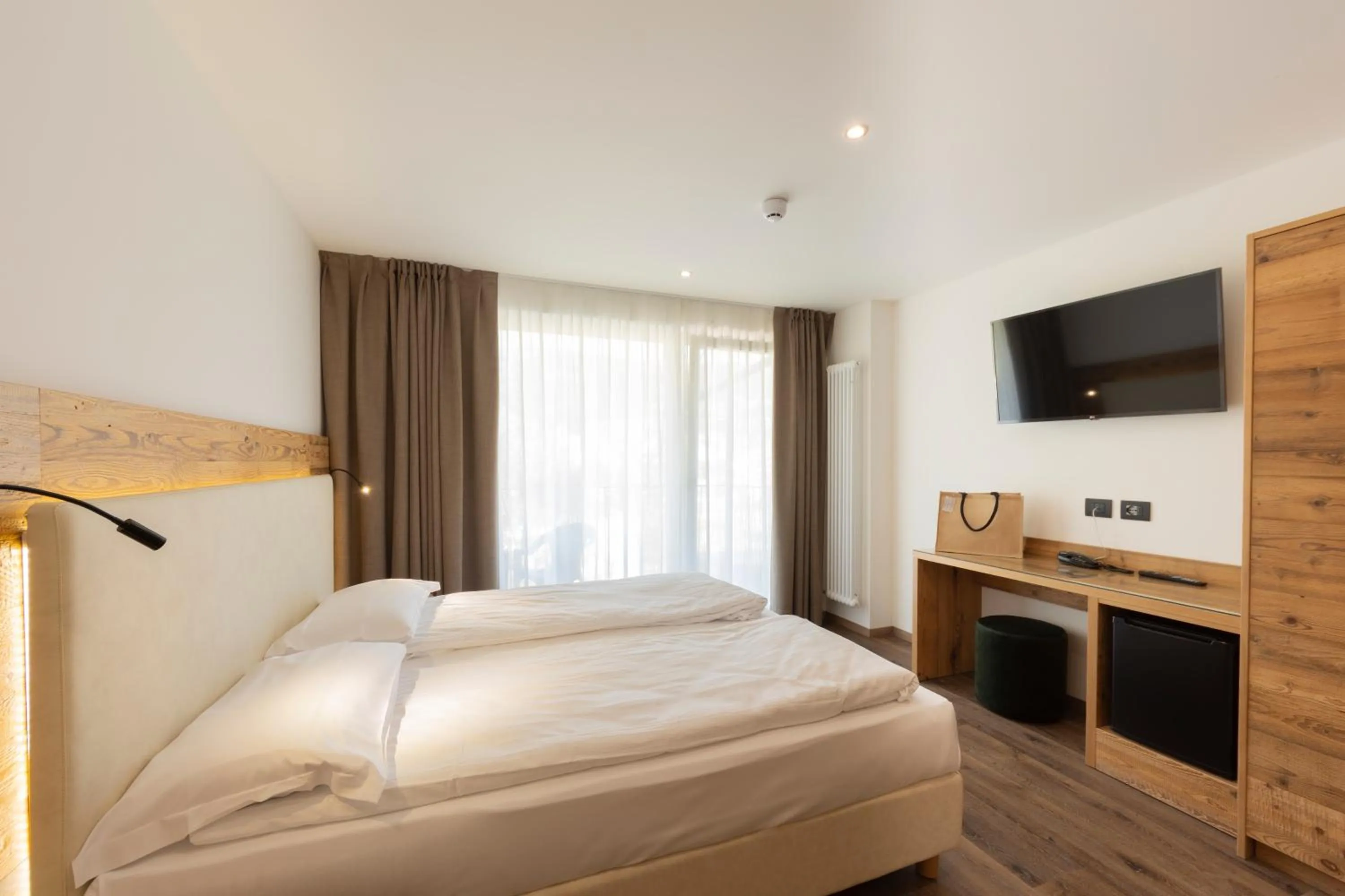 Bed in Active Alm Hotel