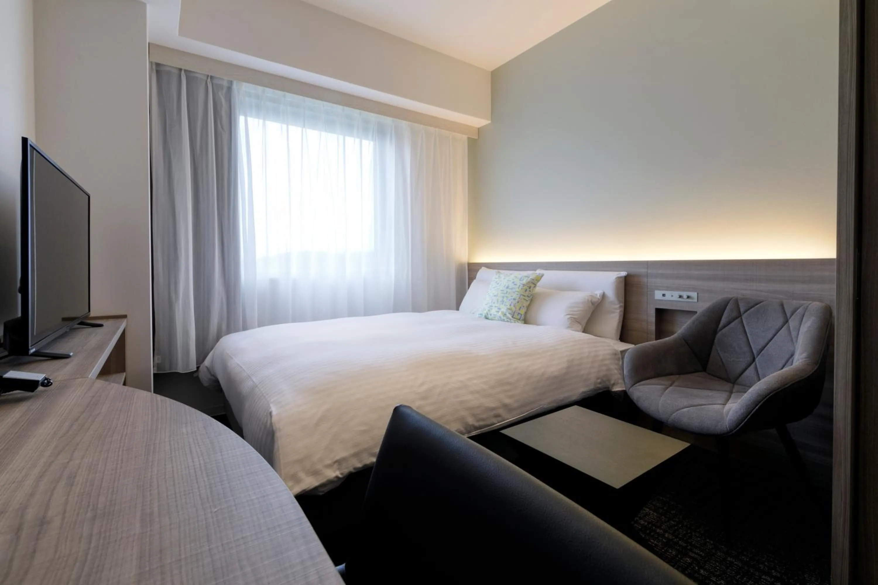 Photo of the whole room, Bed in Glocal Hotel Itoshima