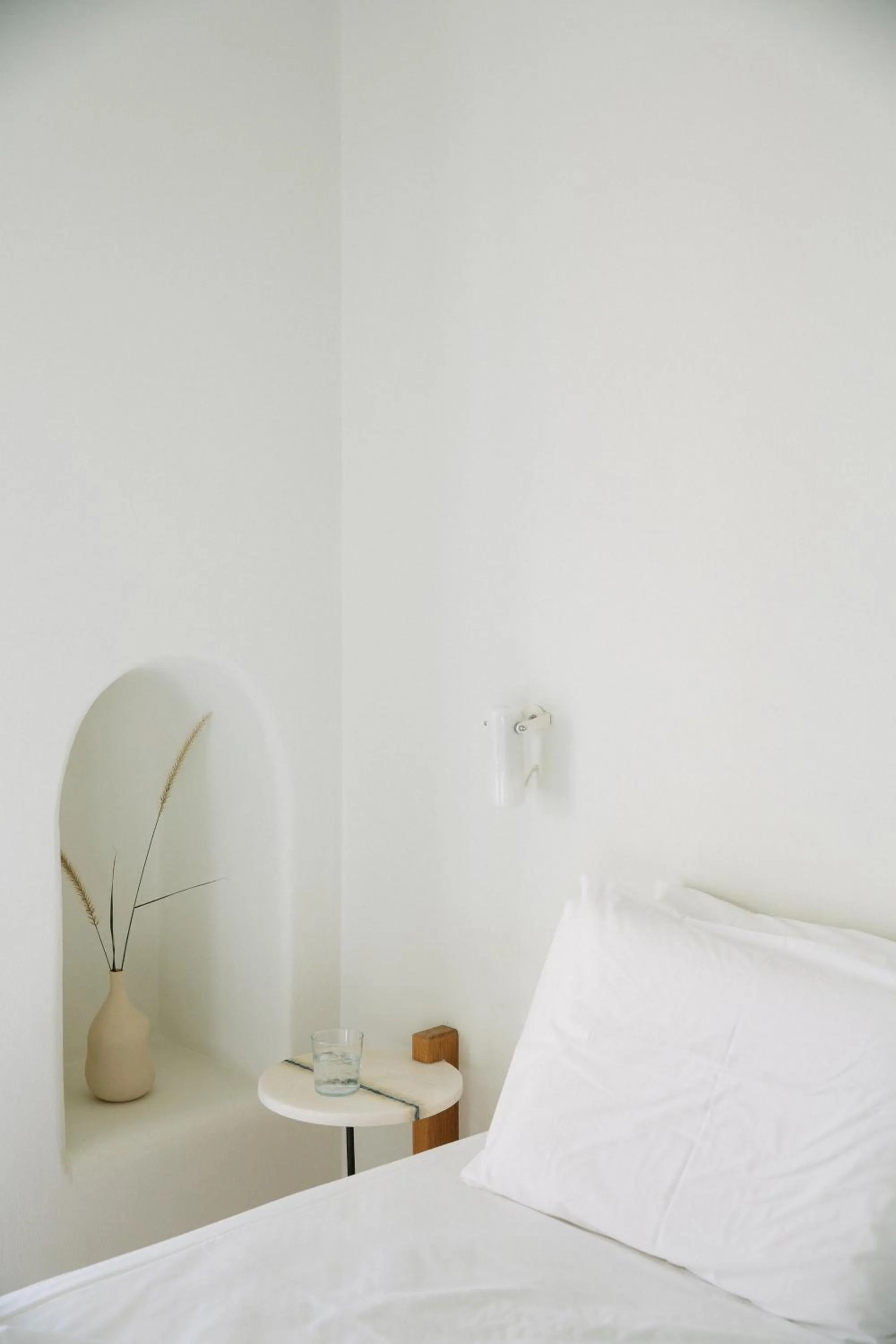 Bed in Ammothines Cycladic Suites
