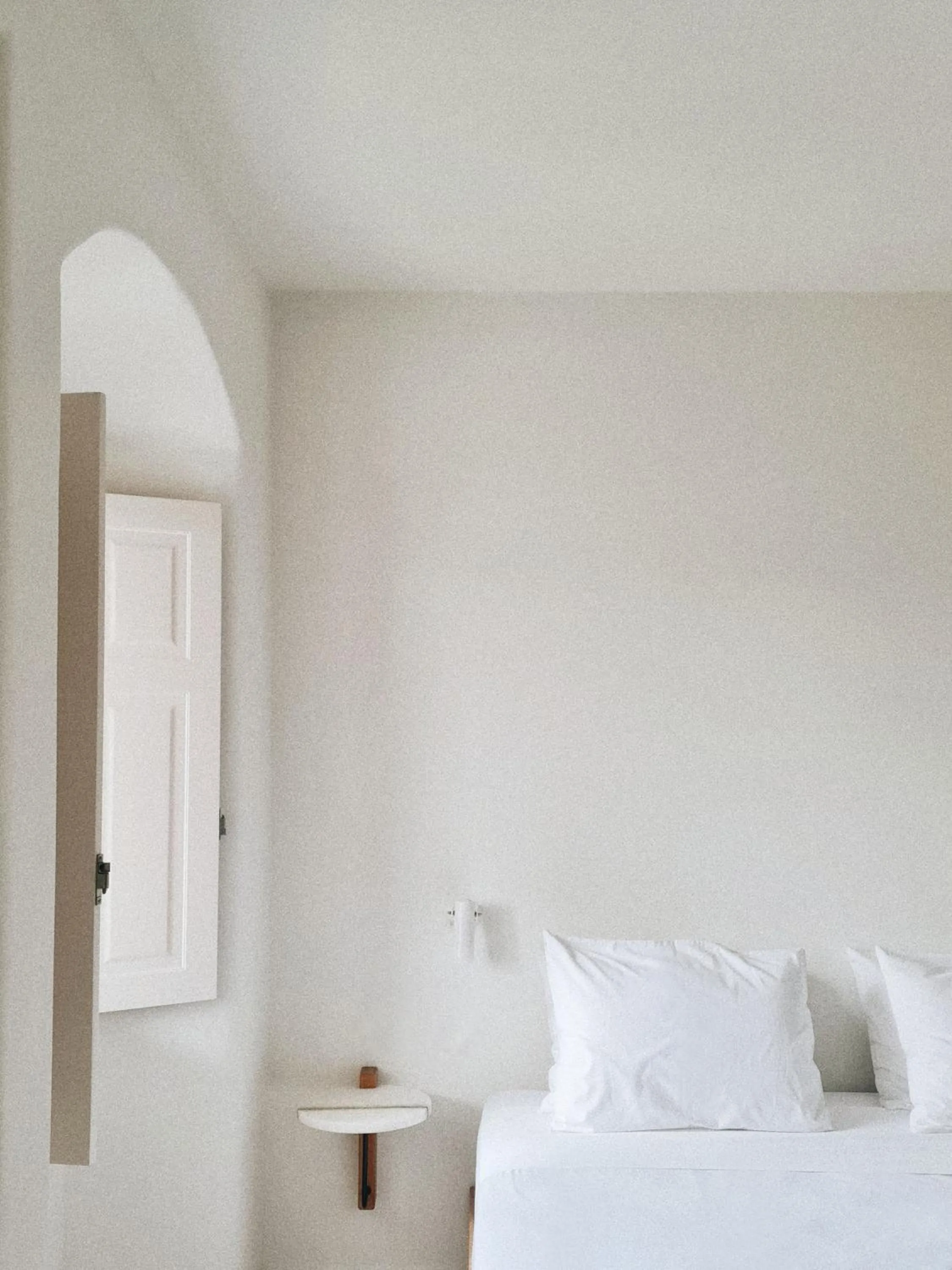 Bed in Ammothines Cycladic Suites
