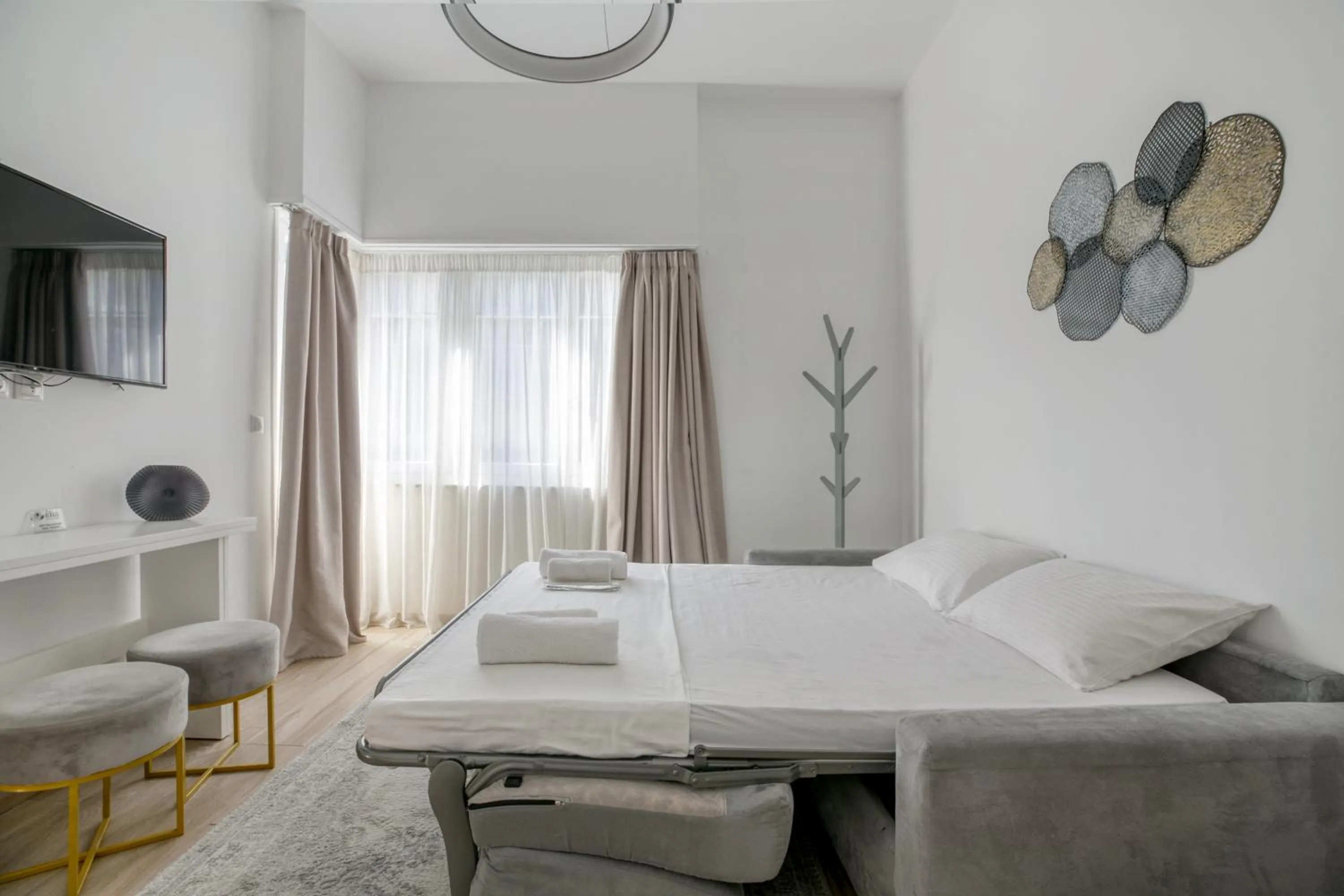Bed in Elia Kolonaki Luxury Apartments