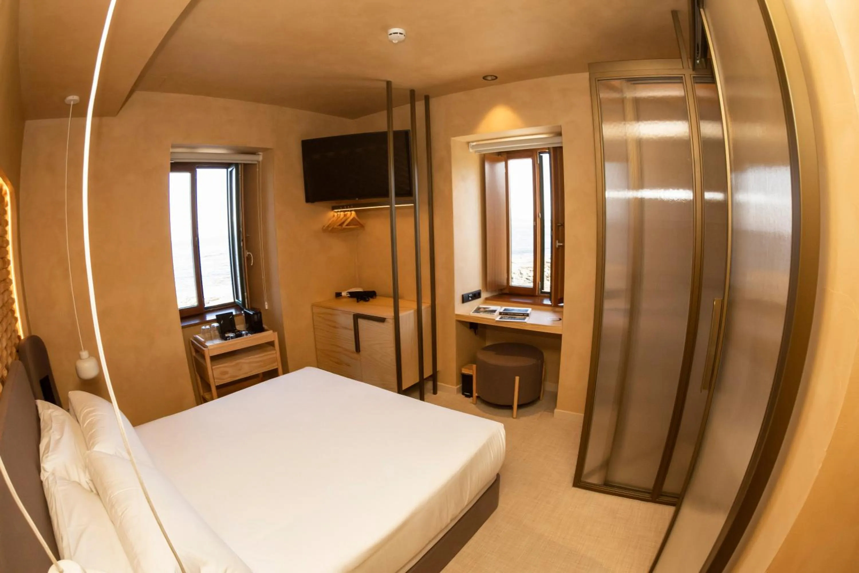 Photo of the whole room, Bed in Hotel Faro Lariño