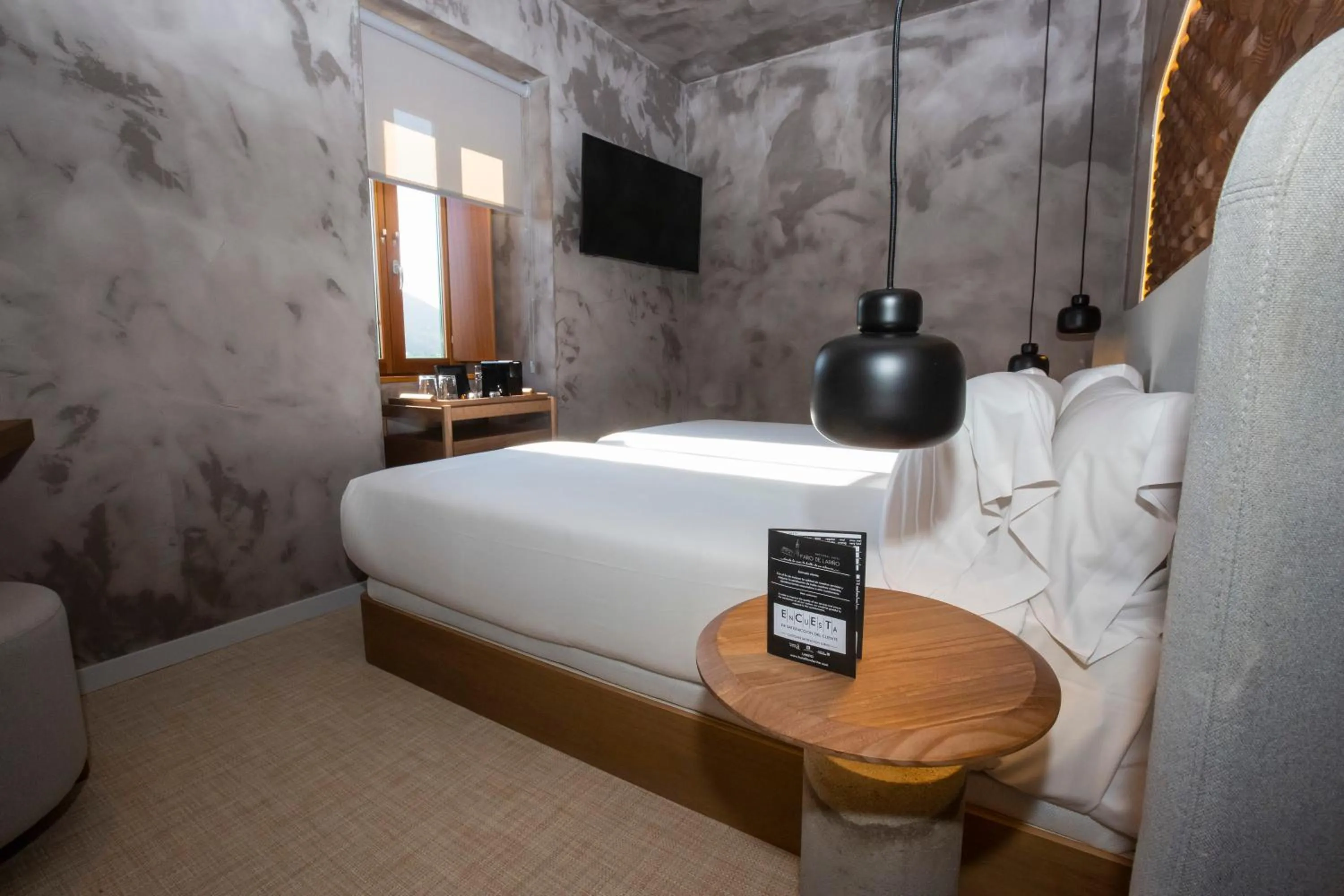 Photo of the whole room, Bed in Hotel Faro Lariño