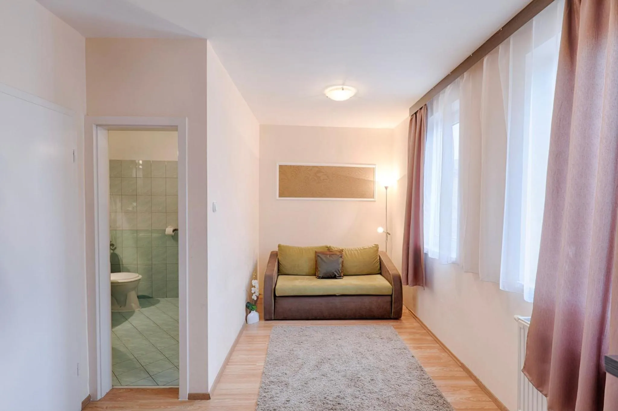 Living room in Triple M Hotel