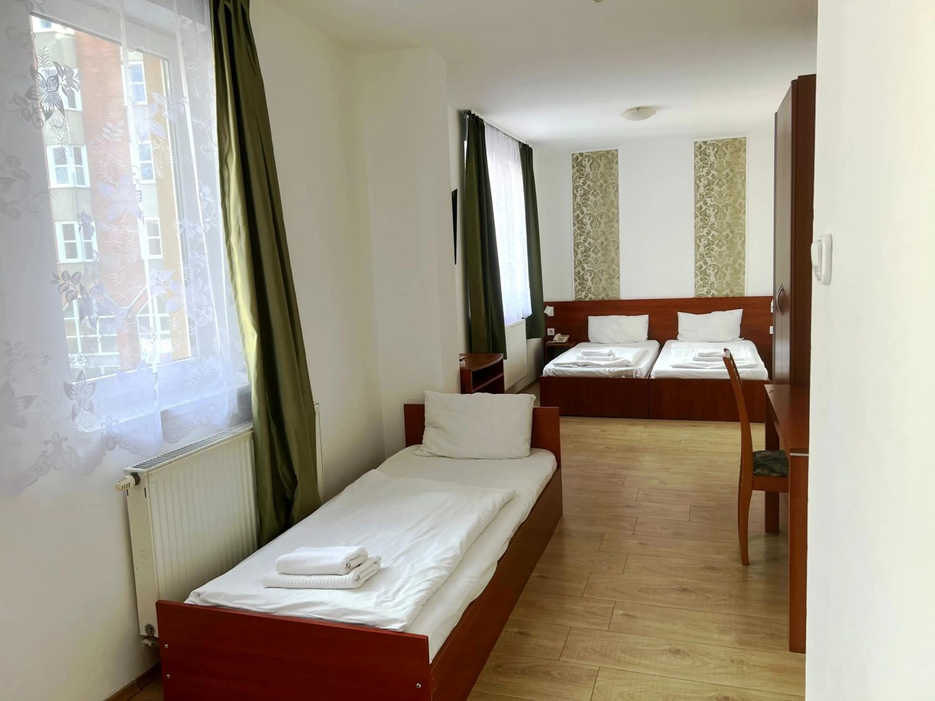 Bedroom, Bed in Triple M Hotel