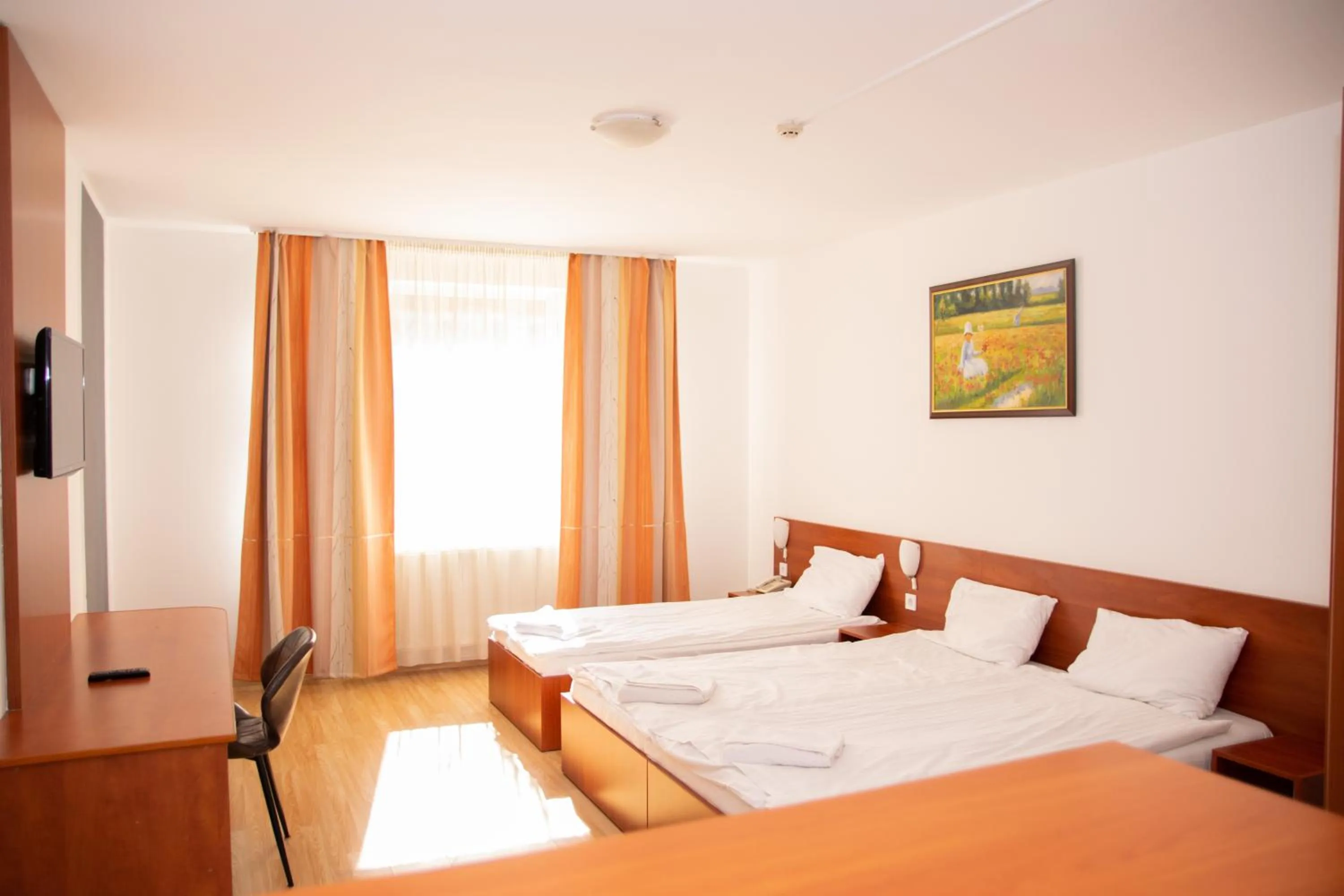 Bedroom, Bed in Triple M Hotel