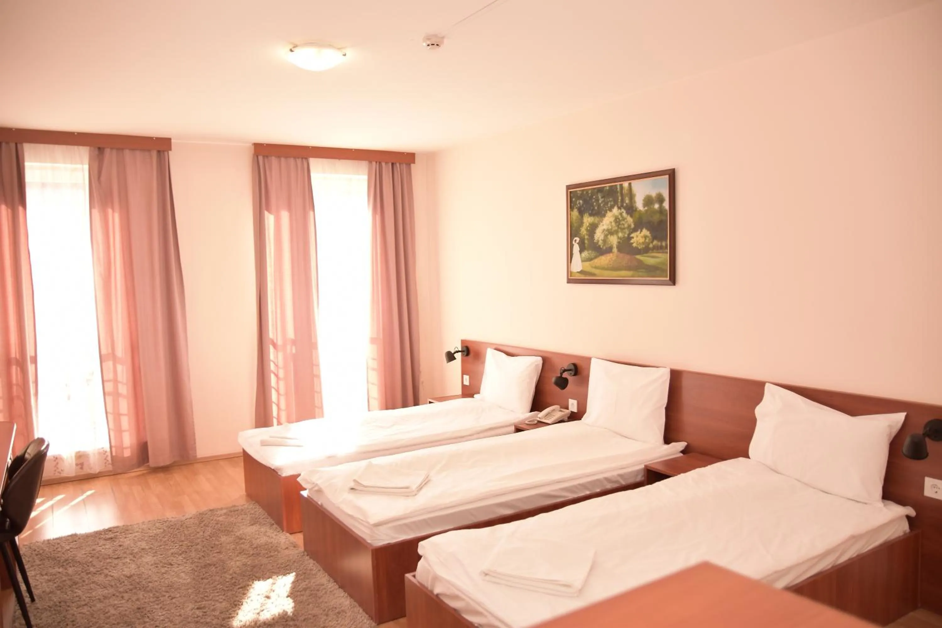 Bedroom, Bed in Triple M Hotel