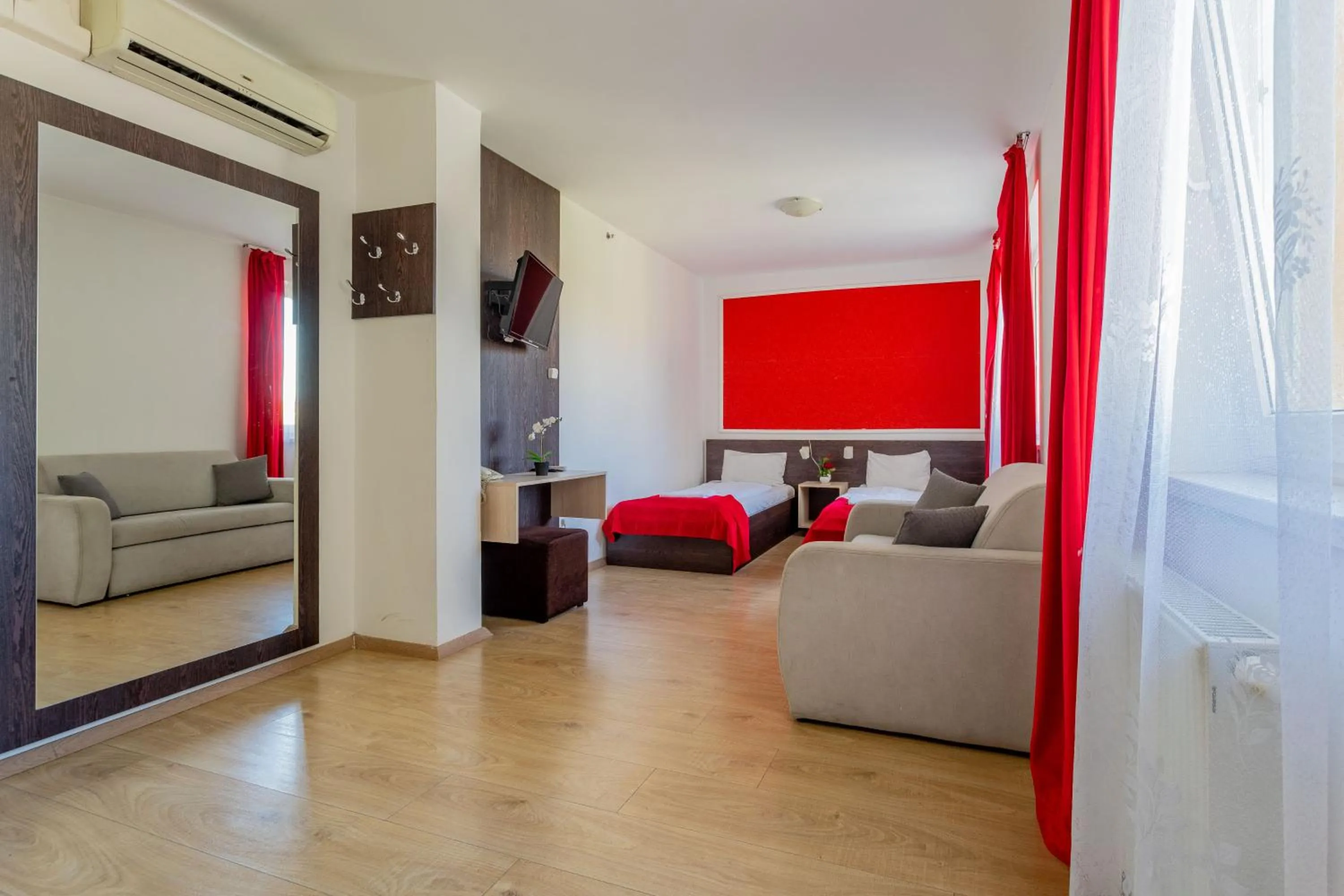 Bed in Triple M Hotel