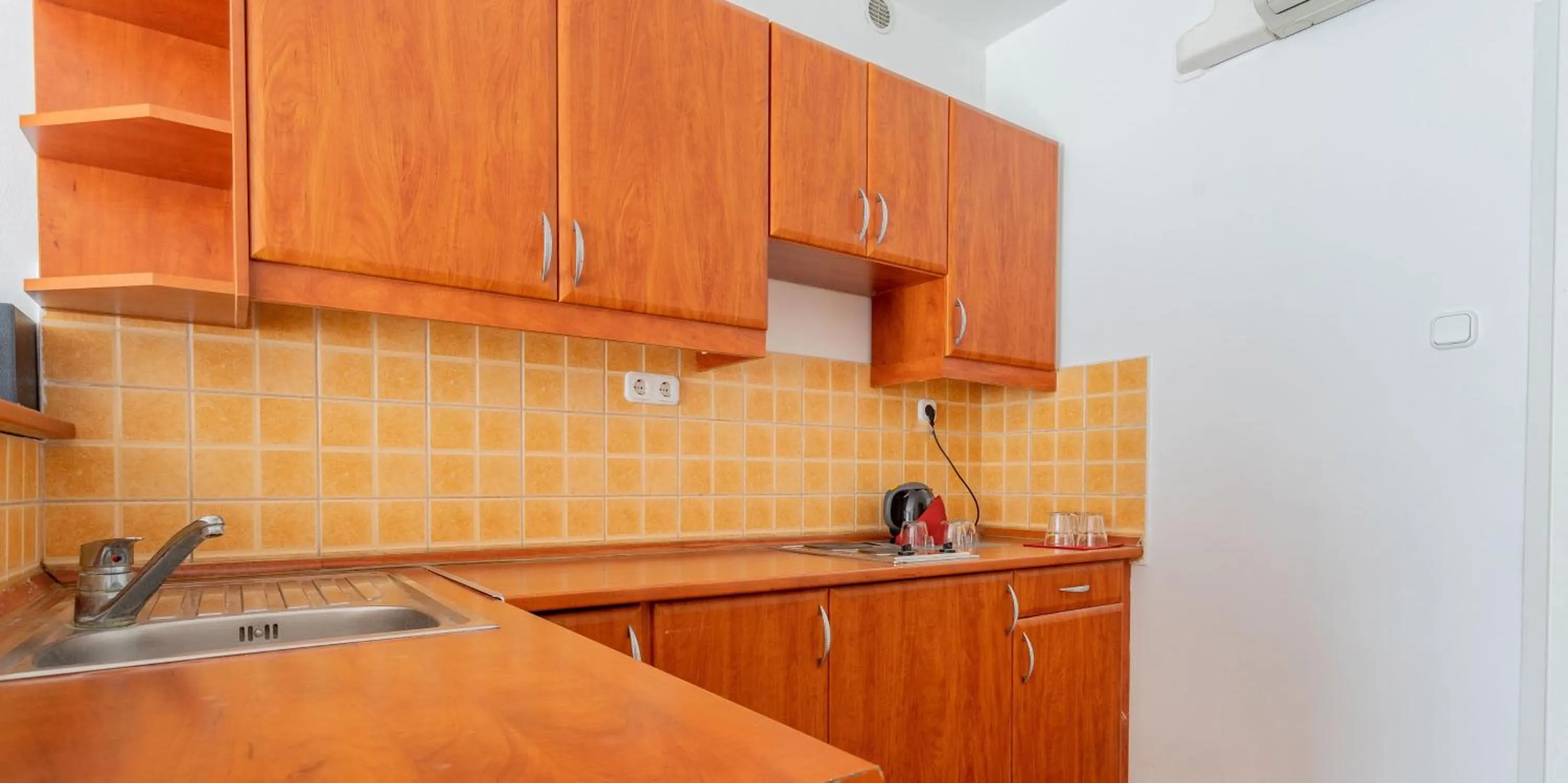 Bed in Triple M Hotel