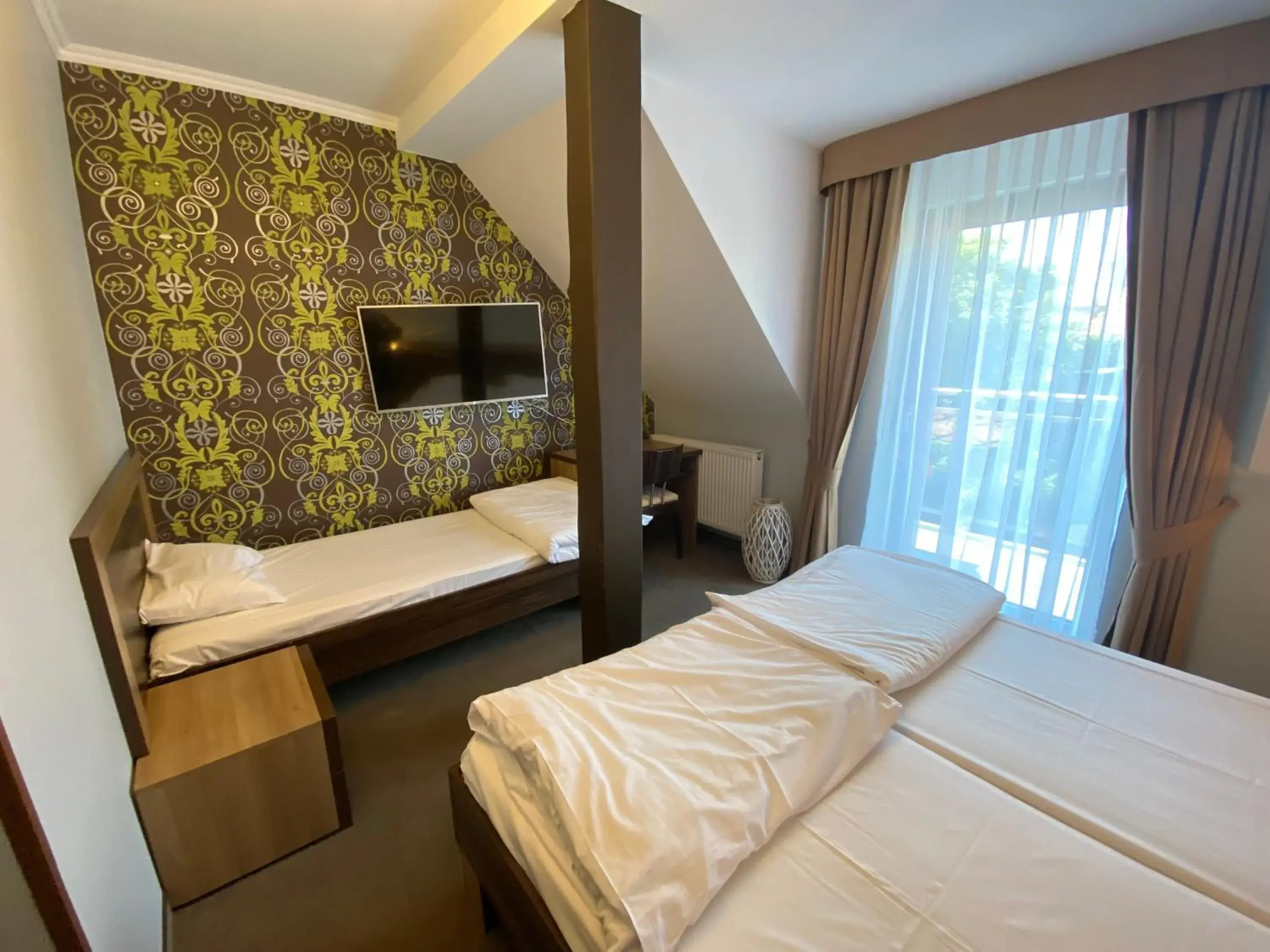 Triple Room with Balcony in Pokoje gościnne Tęczowa Triple Room with Balcony in Pokoje gościnne Tęczowa