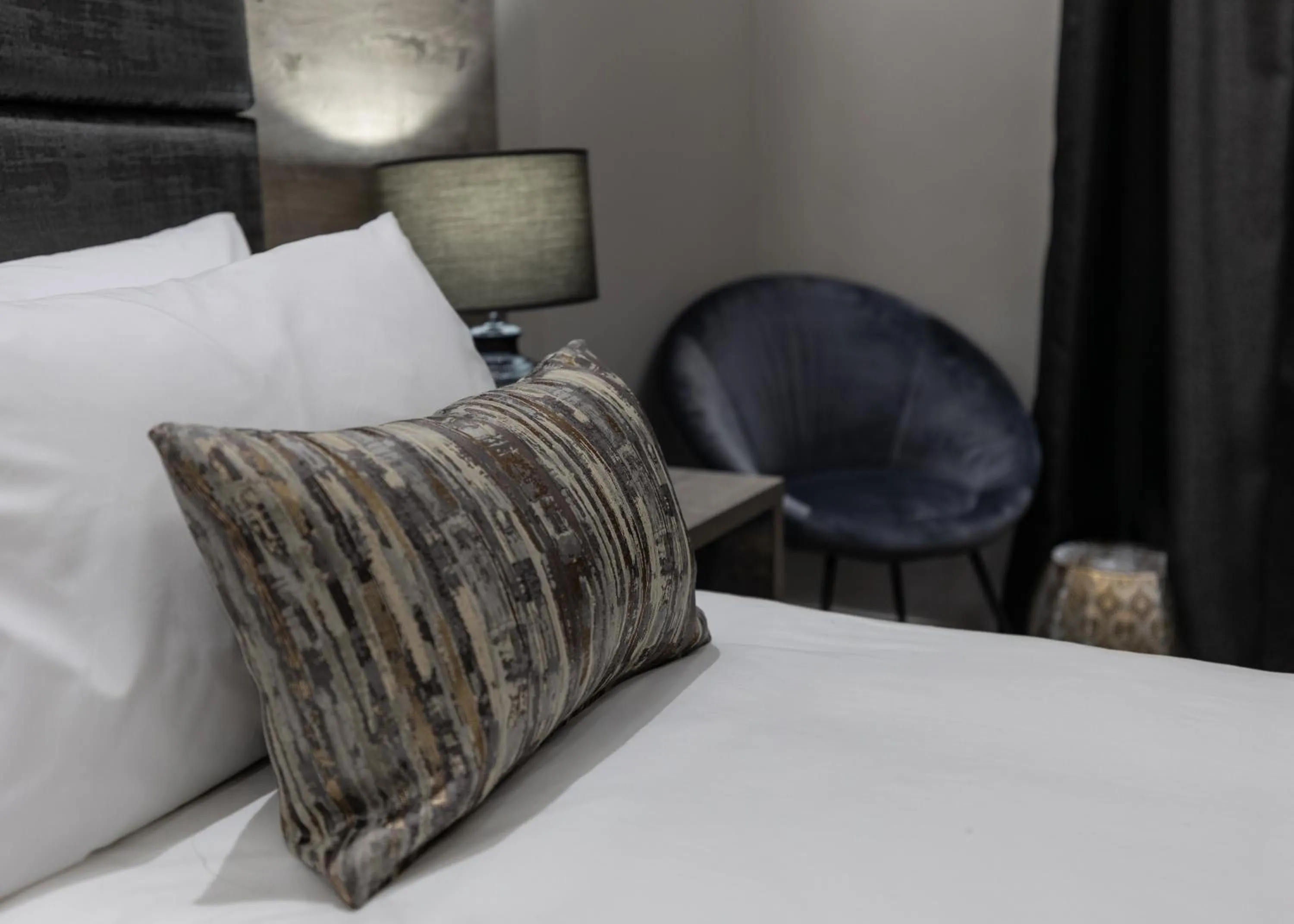 Decorative detail, Bed in Luxe Suites Boutique Hotel