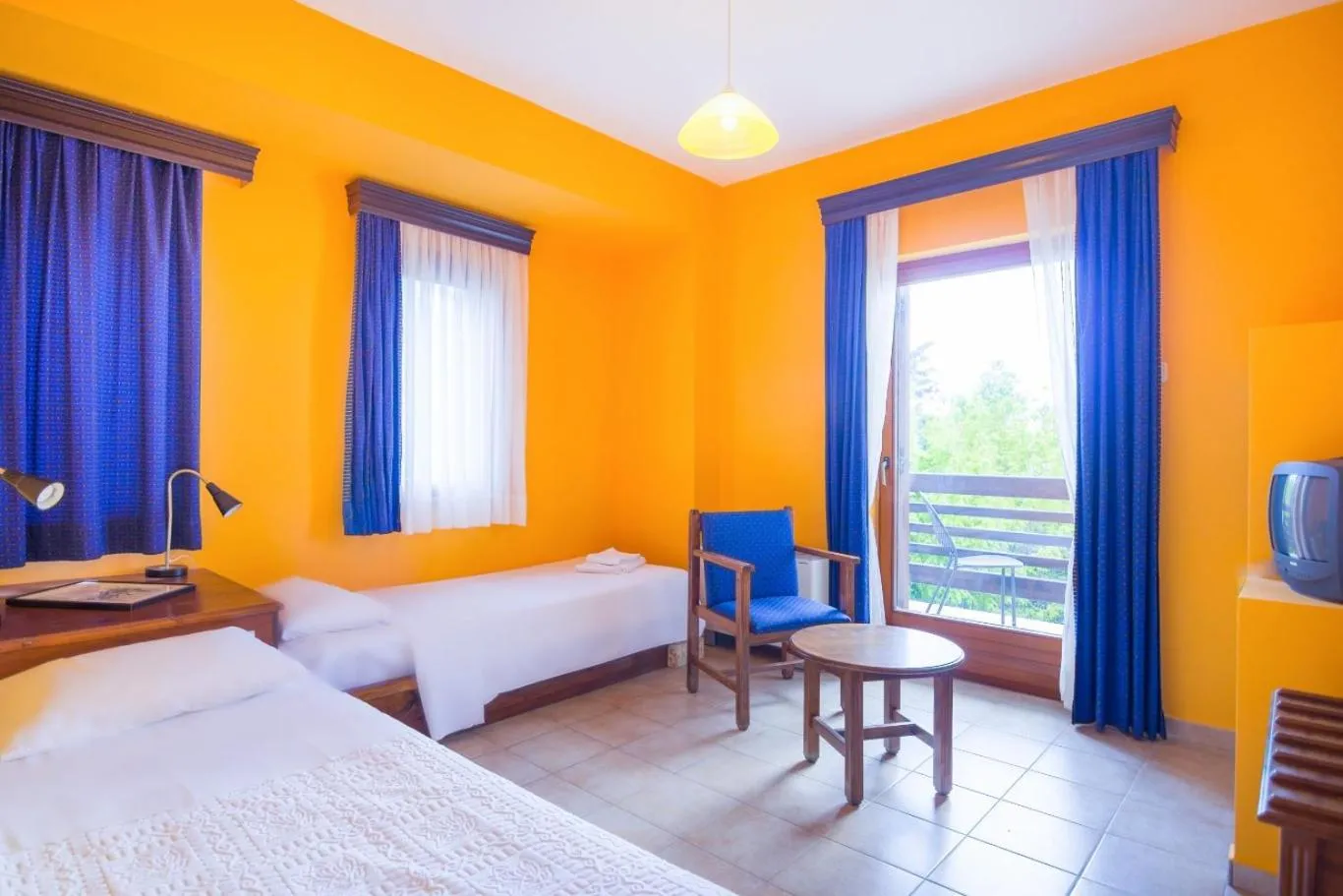 Bed in Roxani Country House Resort