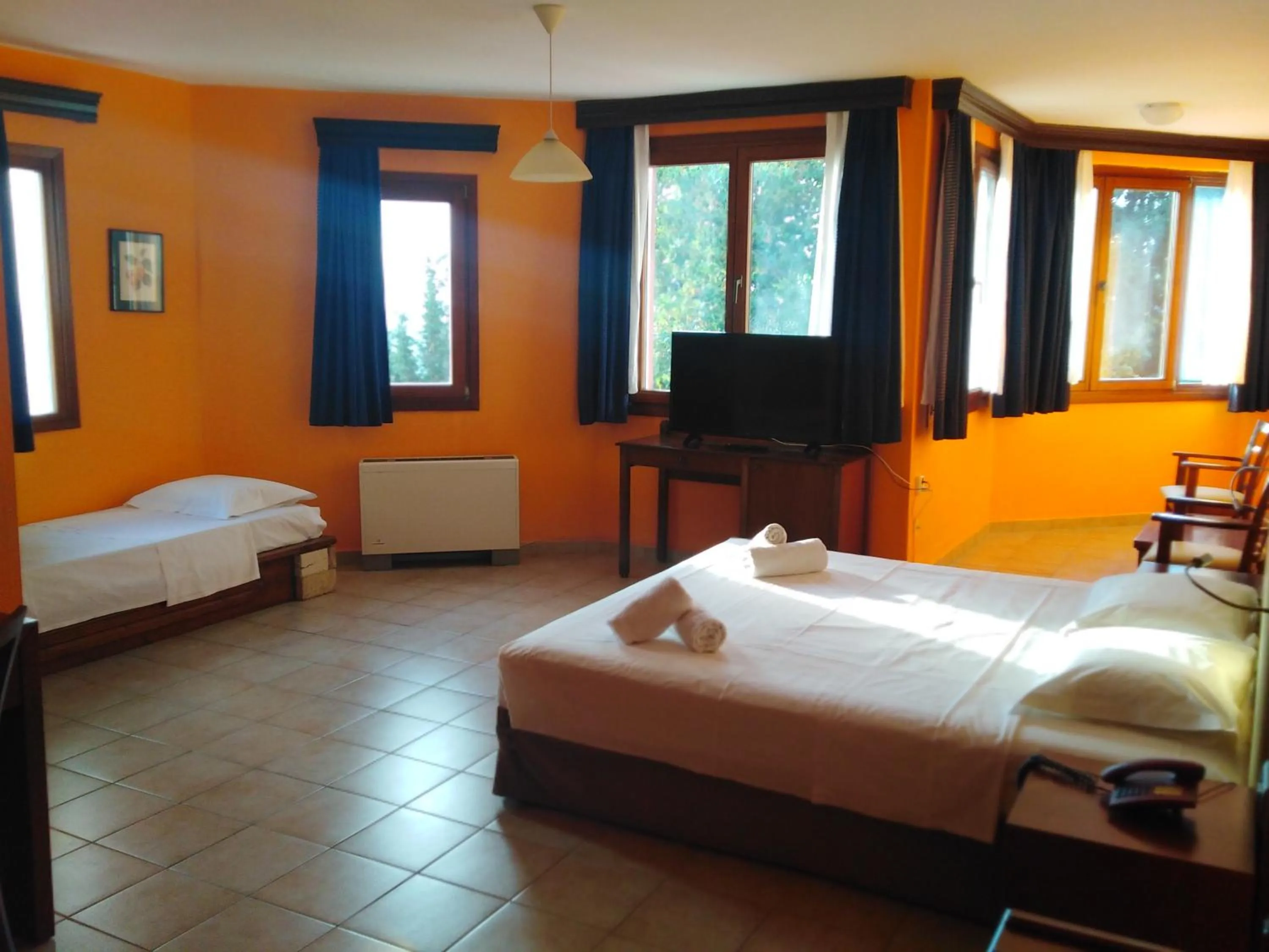 Bed in Roxani Country House Resort