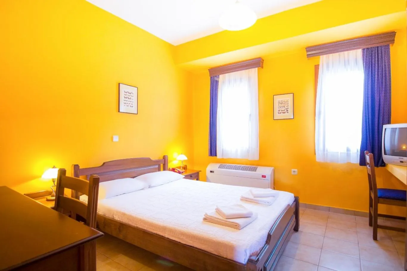 Bed in Roxani Country House Resort