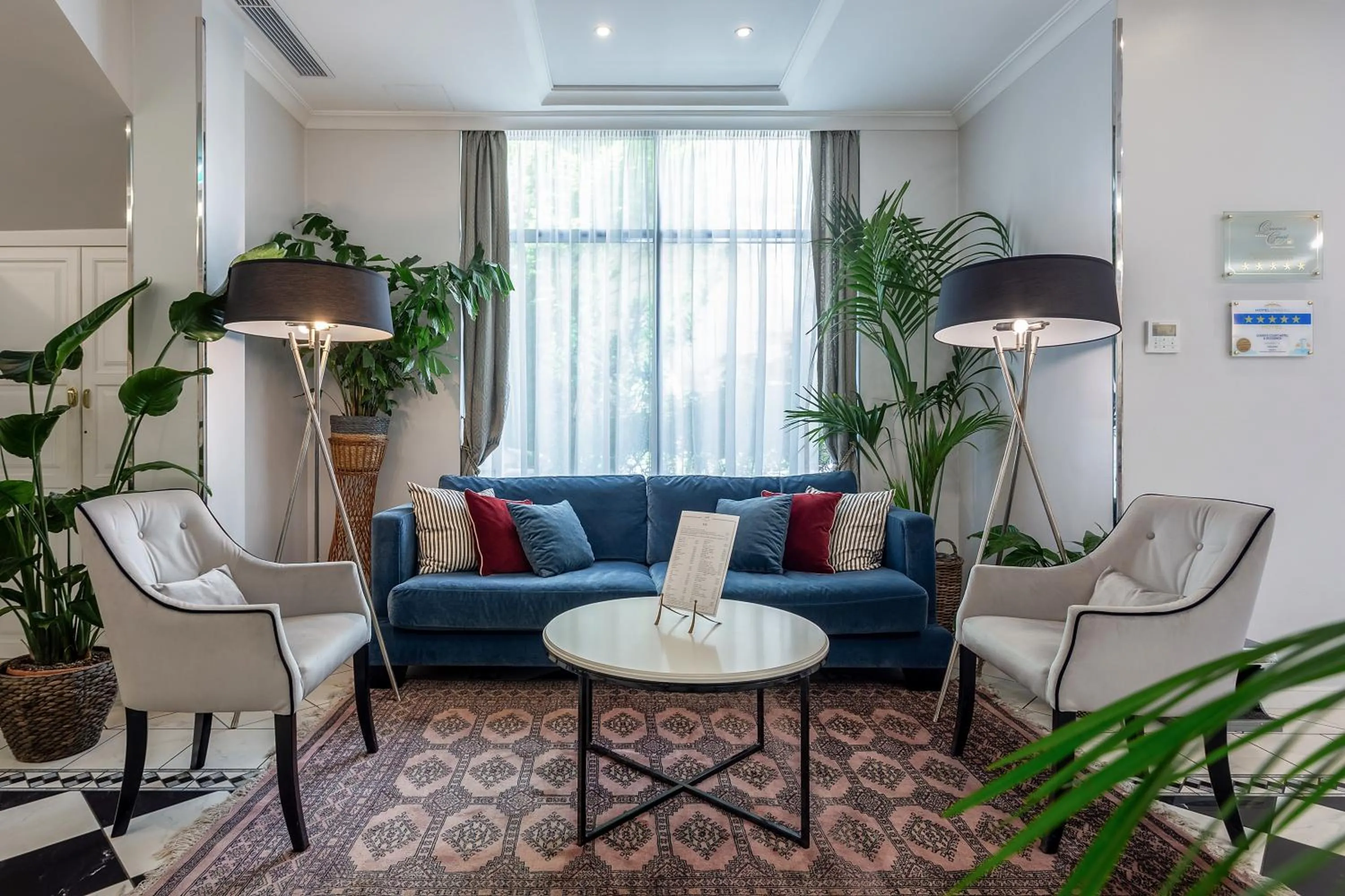 Lobby or reception in Queen's Court Hotel & Residence