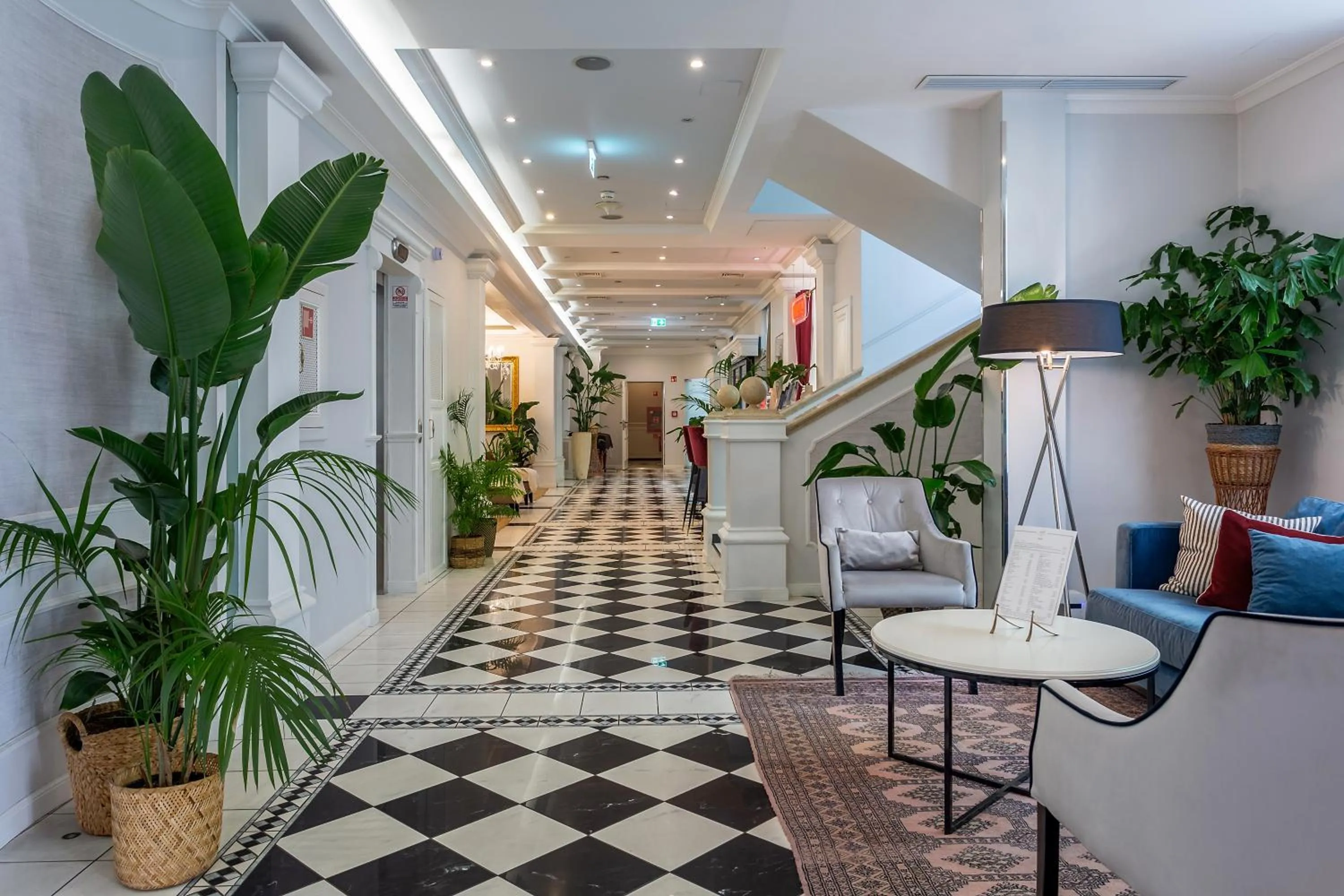 Lobby or reception in Queen's Court Hotel & Residence