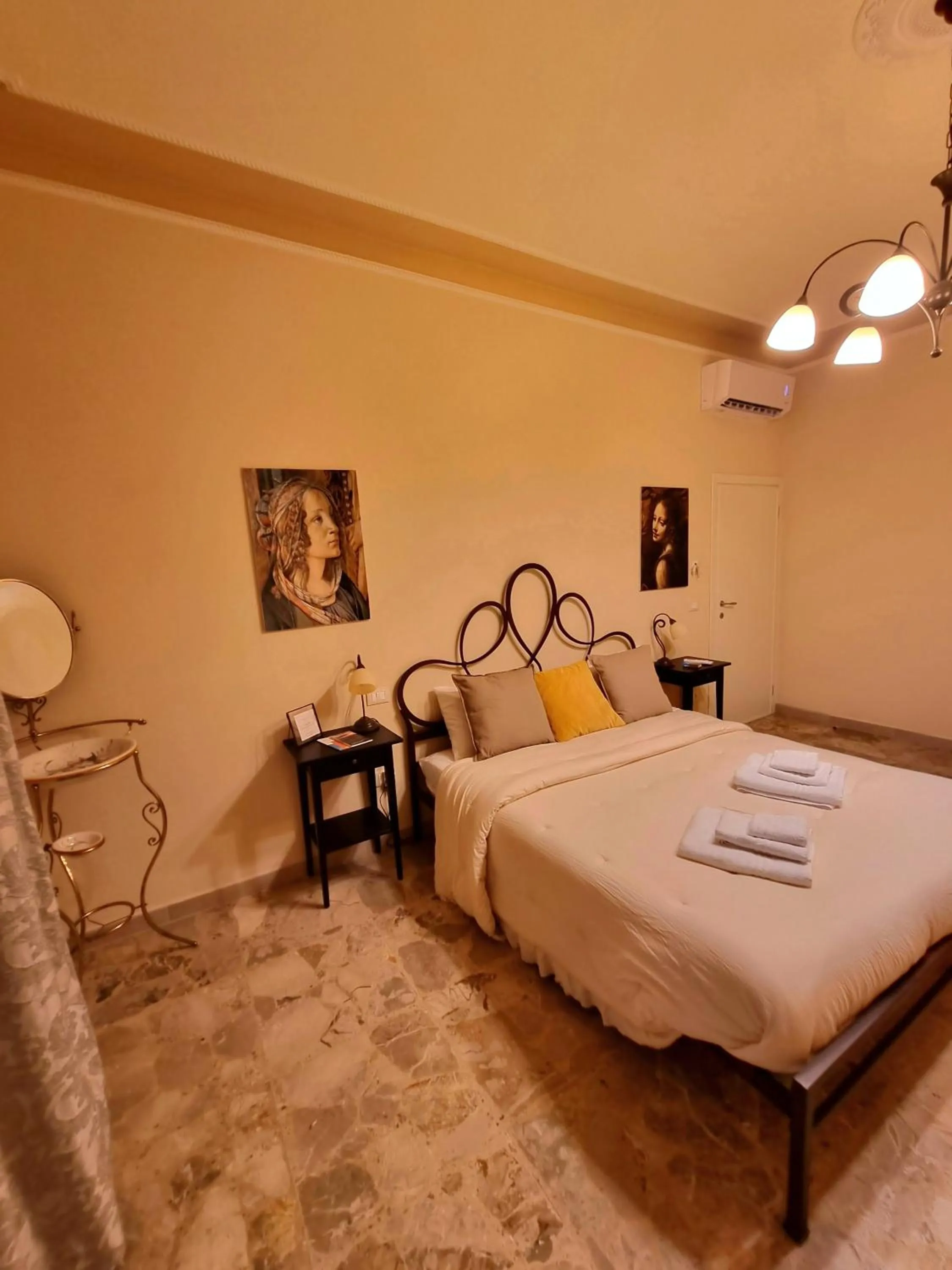 Bed in B&B Le rose di Paola