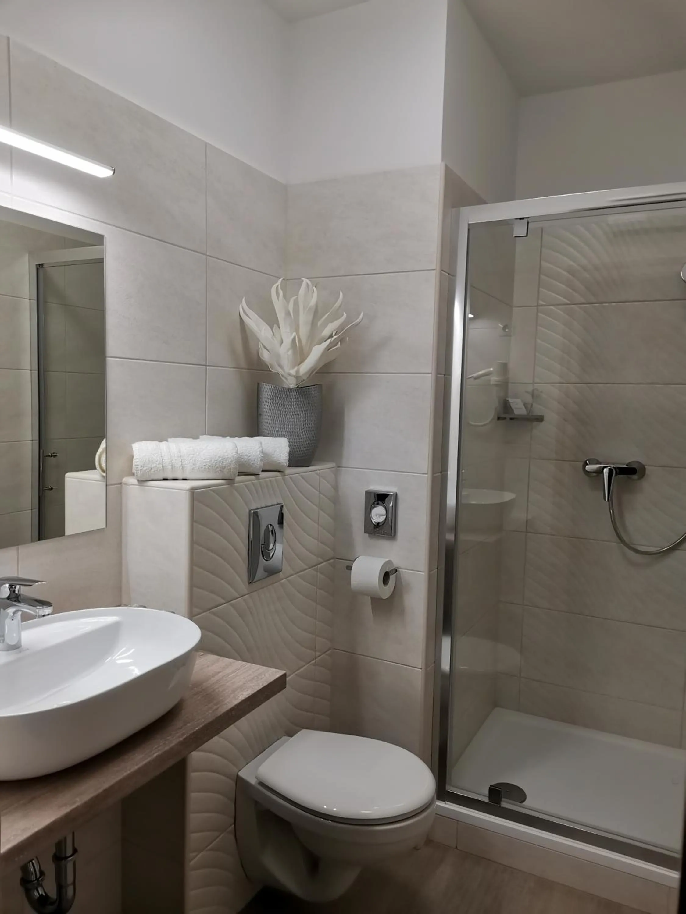 Bathroom in Alfa Hotel