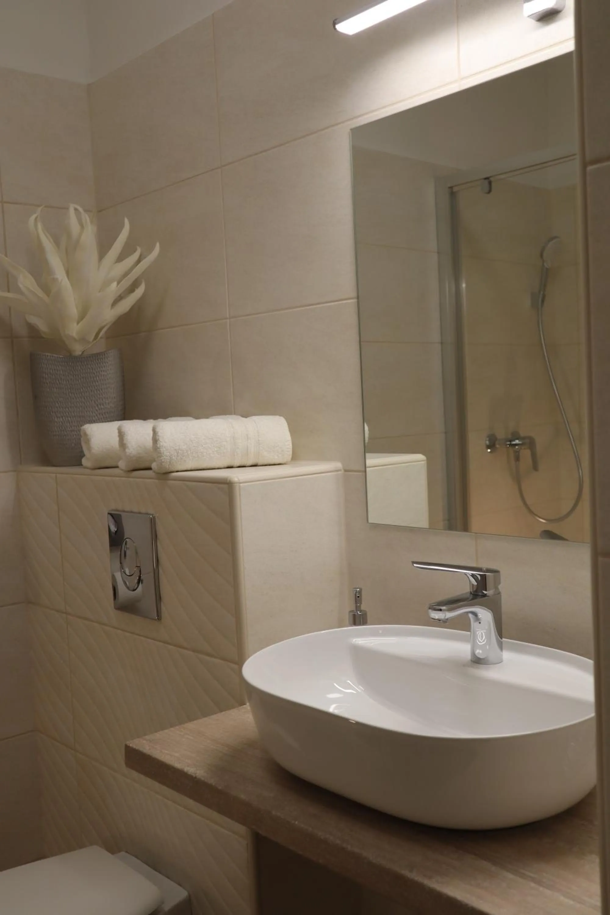 Bathroom in Alfa Hotel