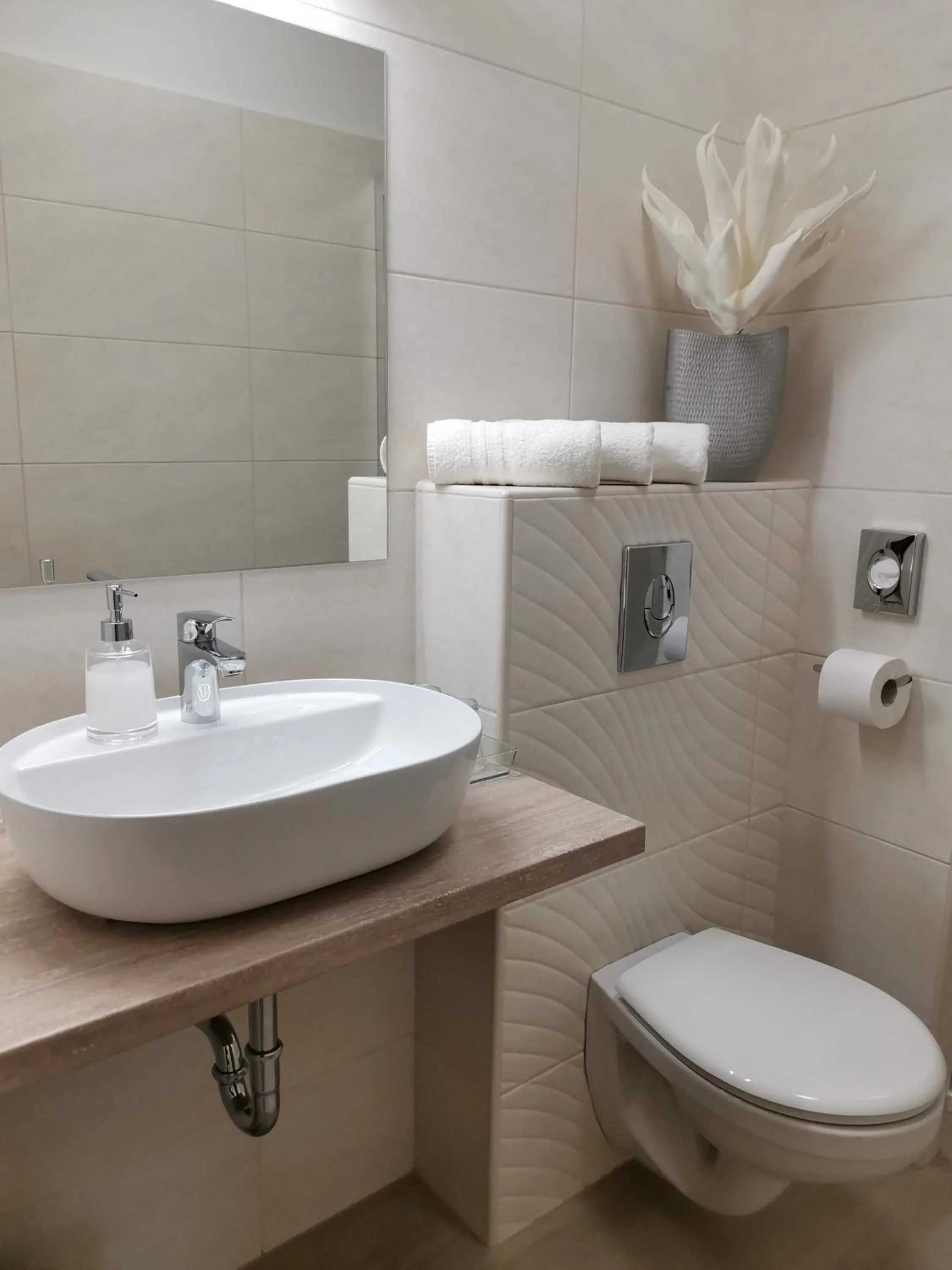 Bathroom in Alfa Hotel