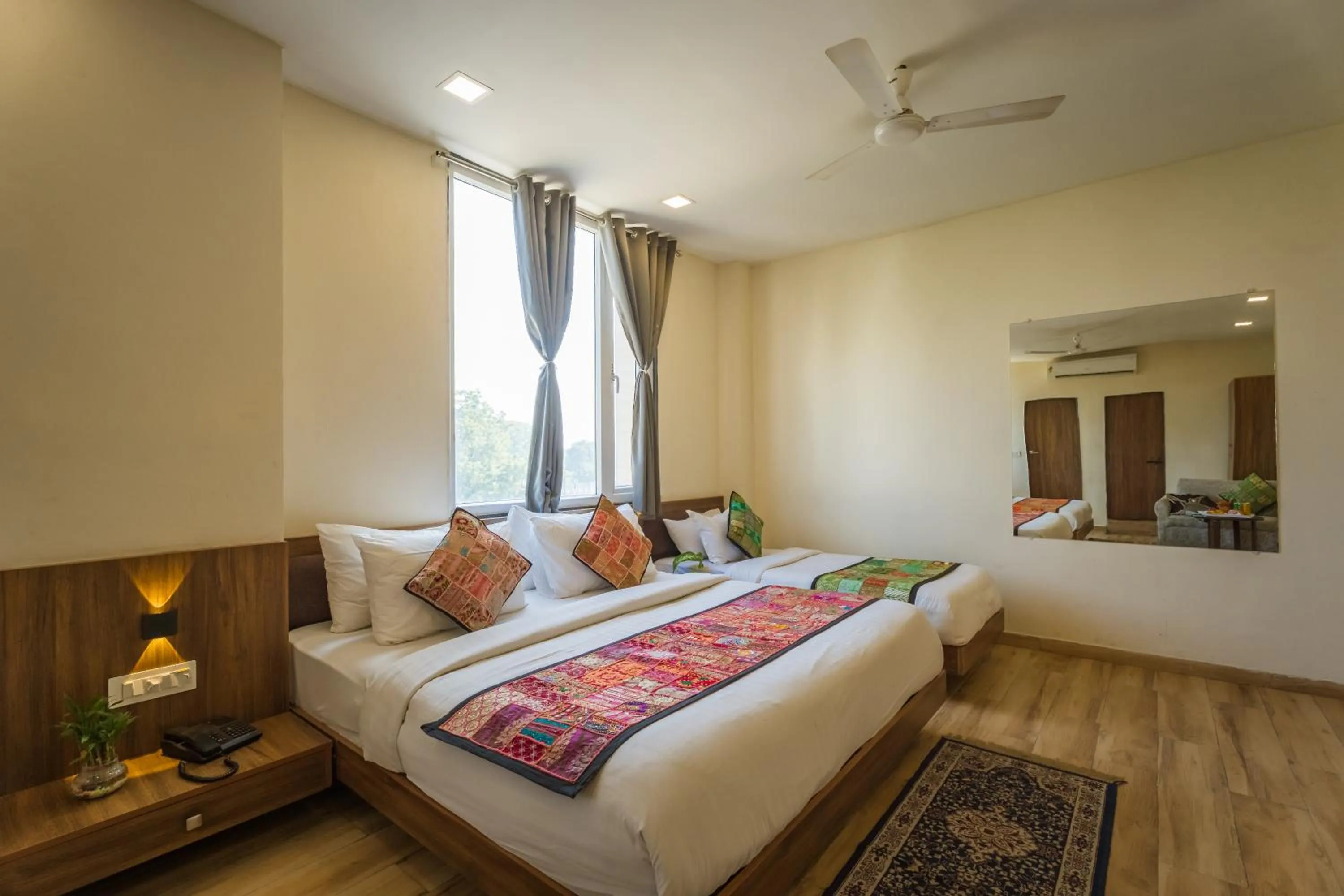 Bed in Tripli Hotels Le Shelton