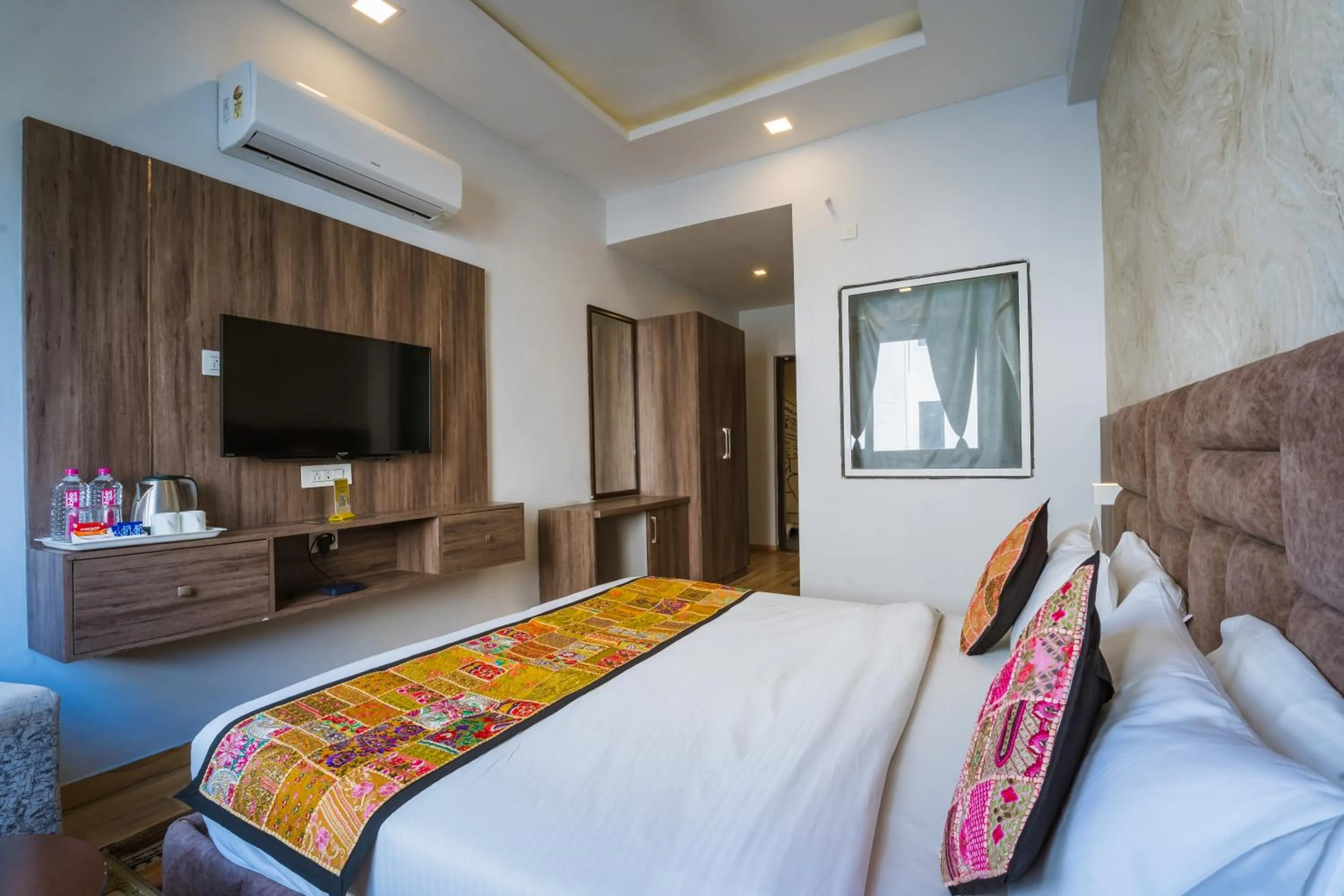 Bed in Tripli Hotels Le Shelton