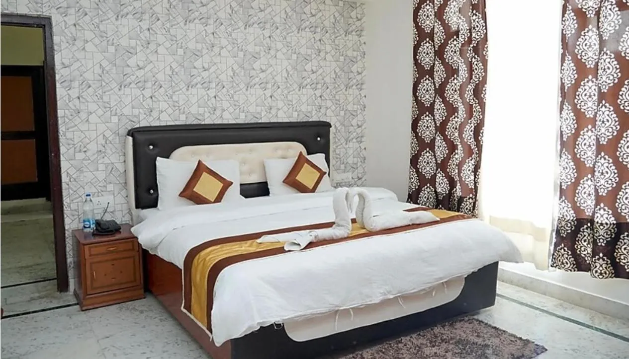 Bed in Pink Park by Panache Hotels