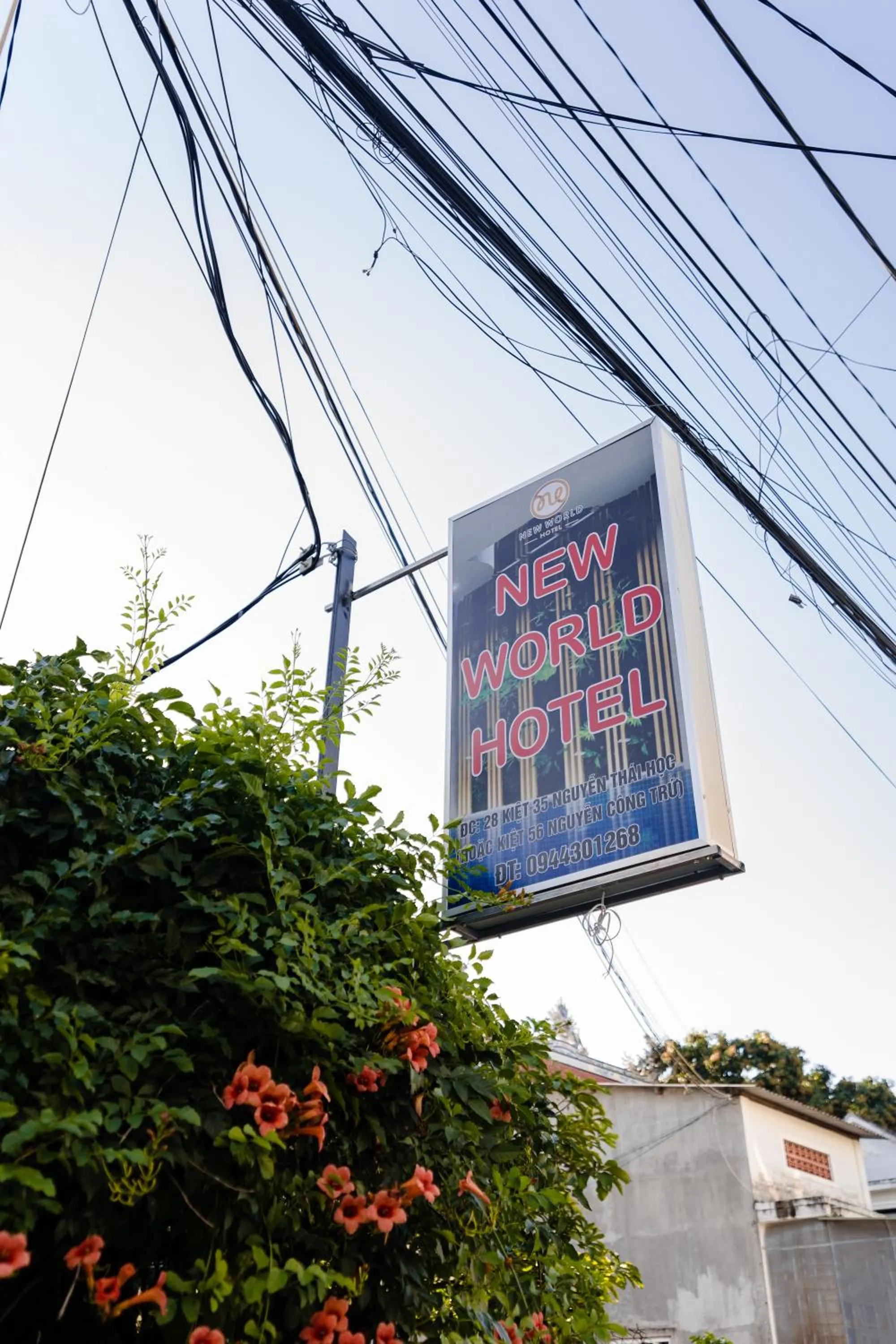 Property logo or sign in New World Hotel