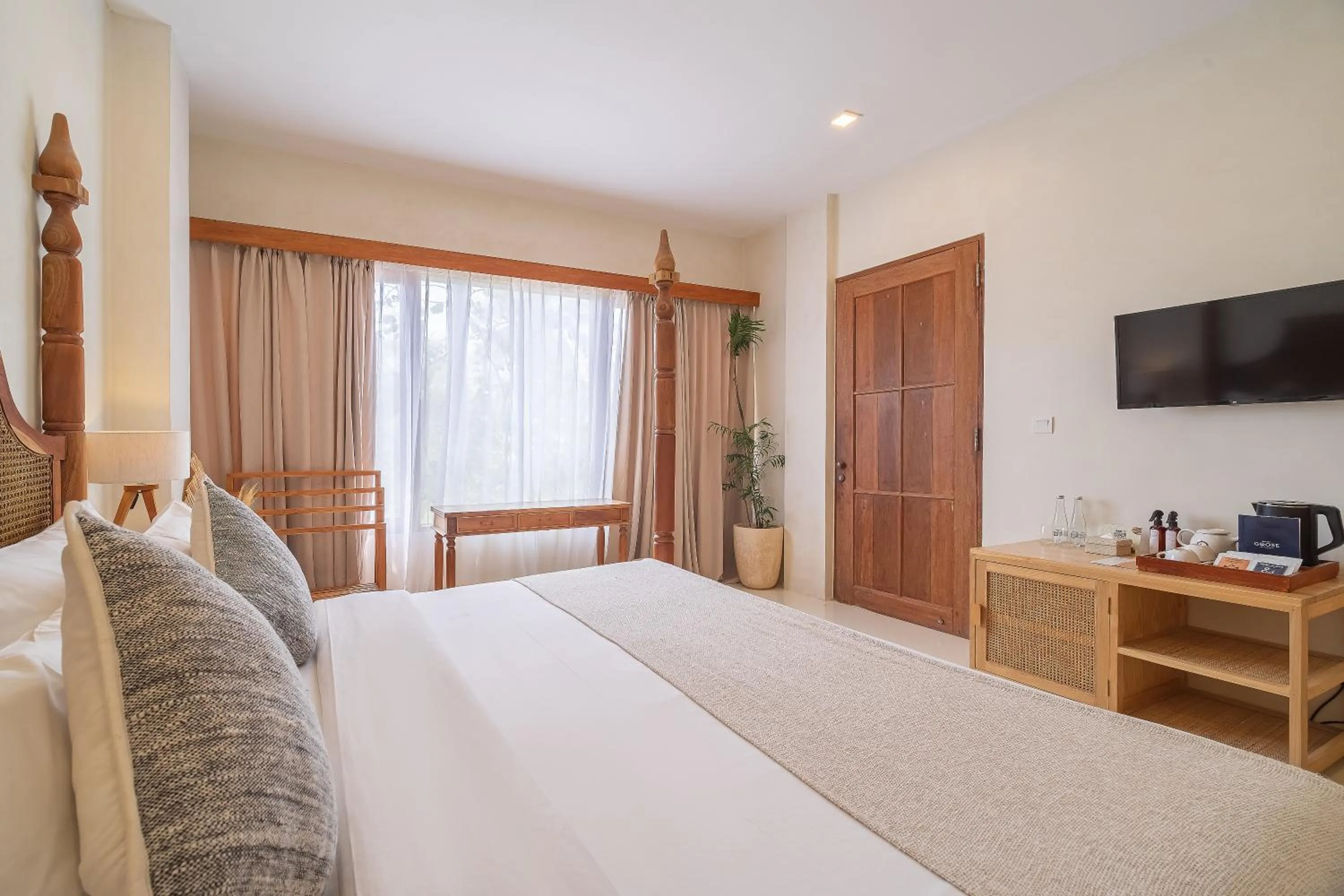 Bed in White Goose Boutique Hotel