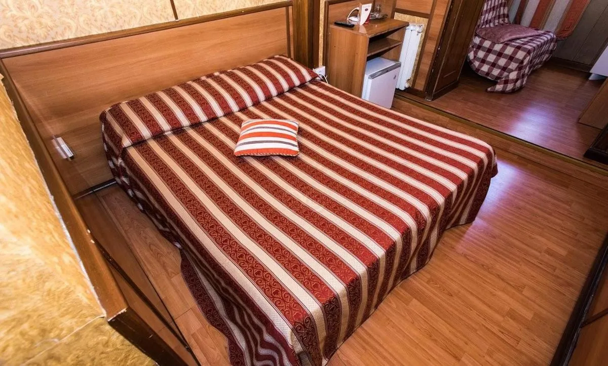 Bed in Hotel Artromano