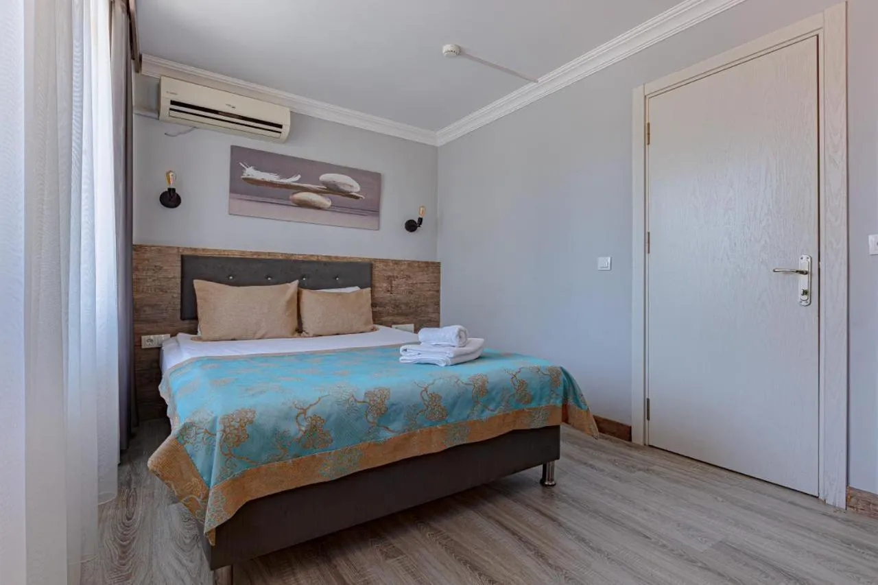 Bed in Seven City Hotel