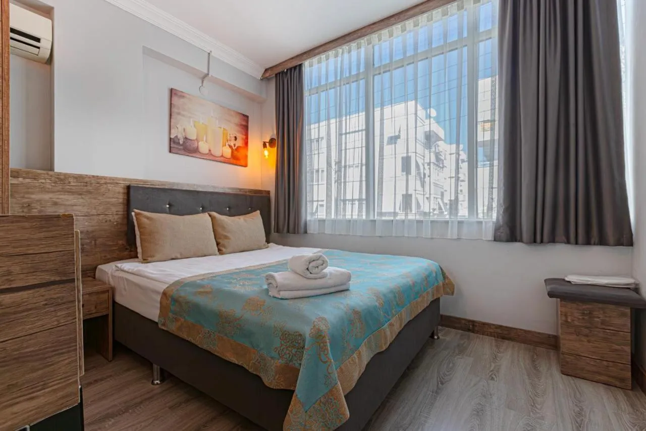 Bed in Seven City Hotel