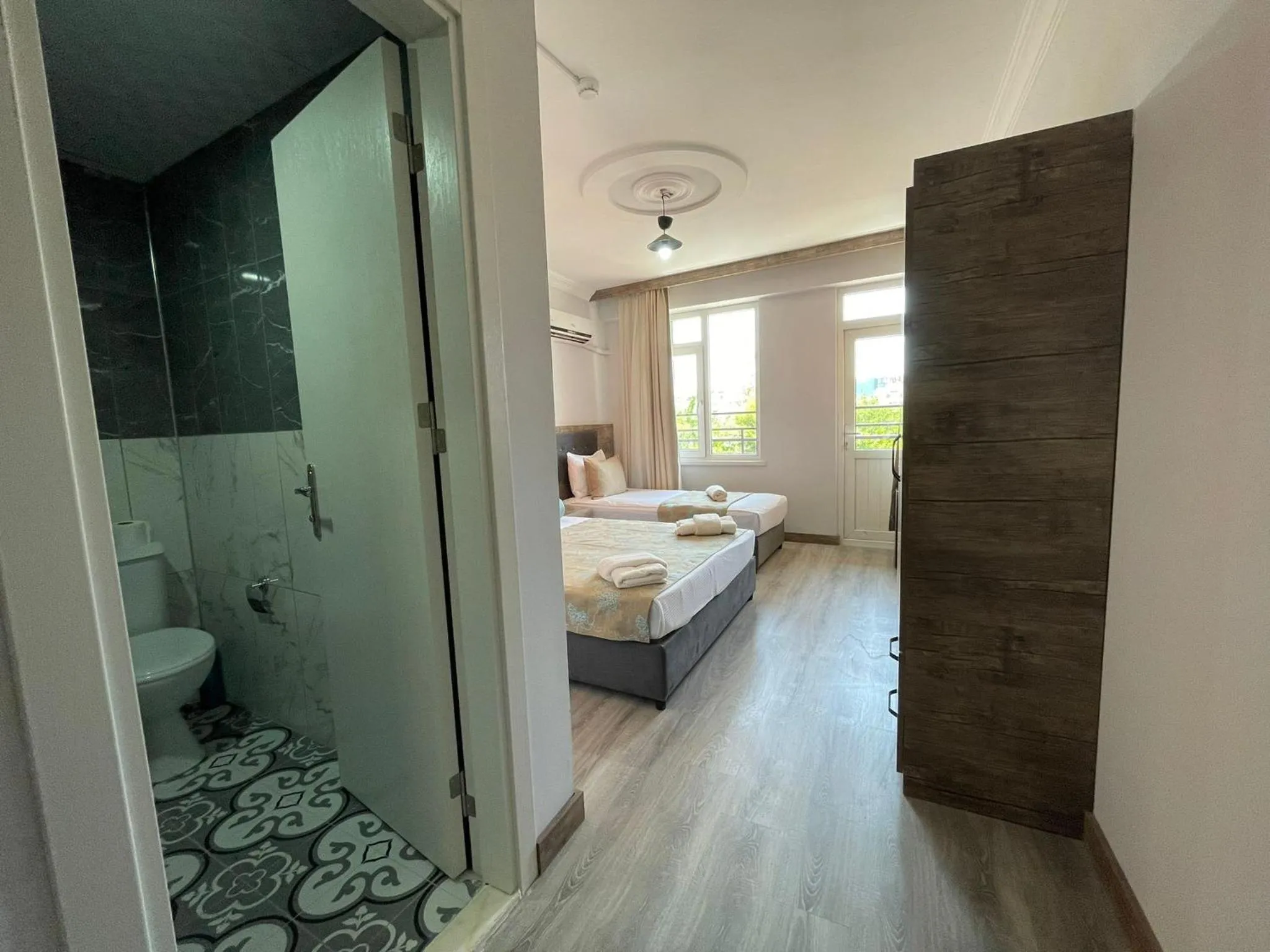 Photo of the whole room, Bed in Seven City Hotel