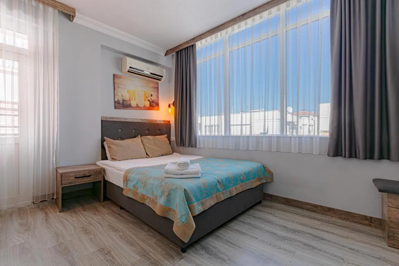 Bed in Seven City Hotel