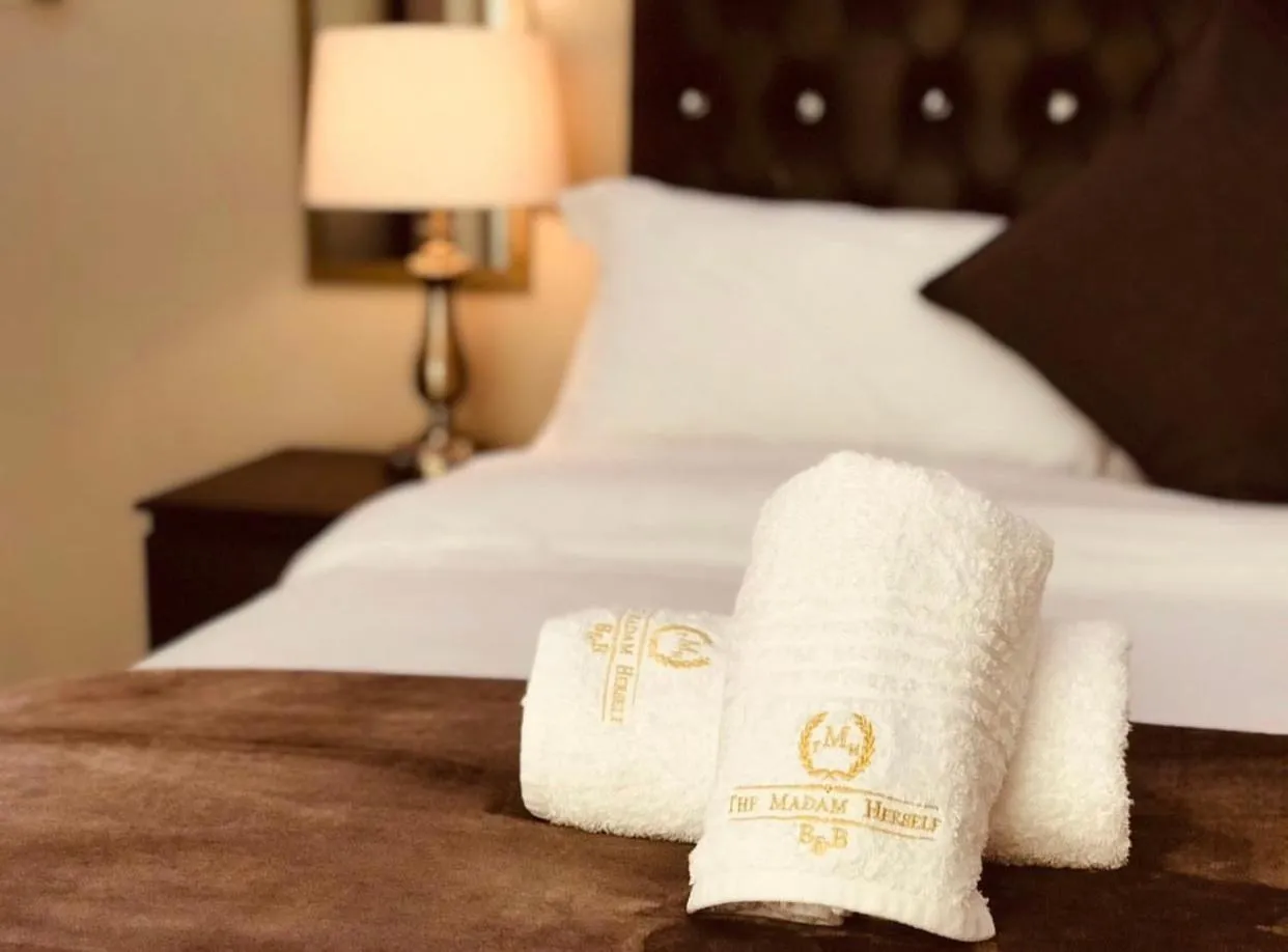 Bed in The Madam Herself B&B