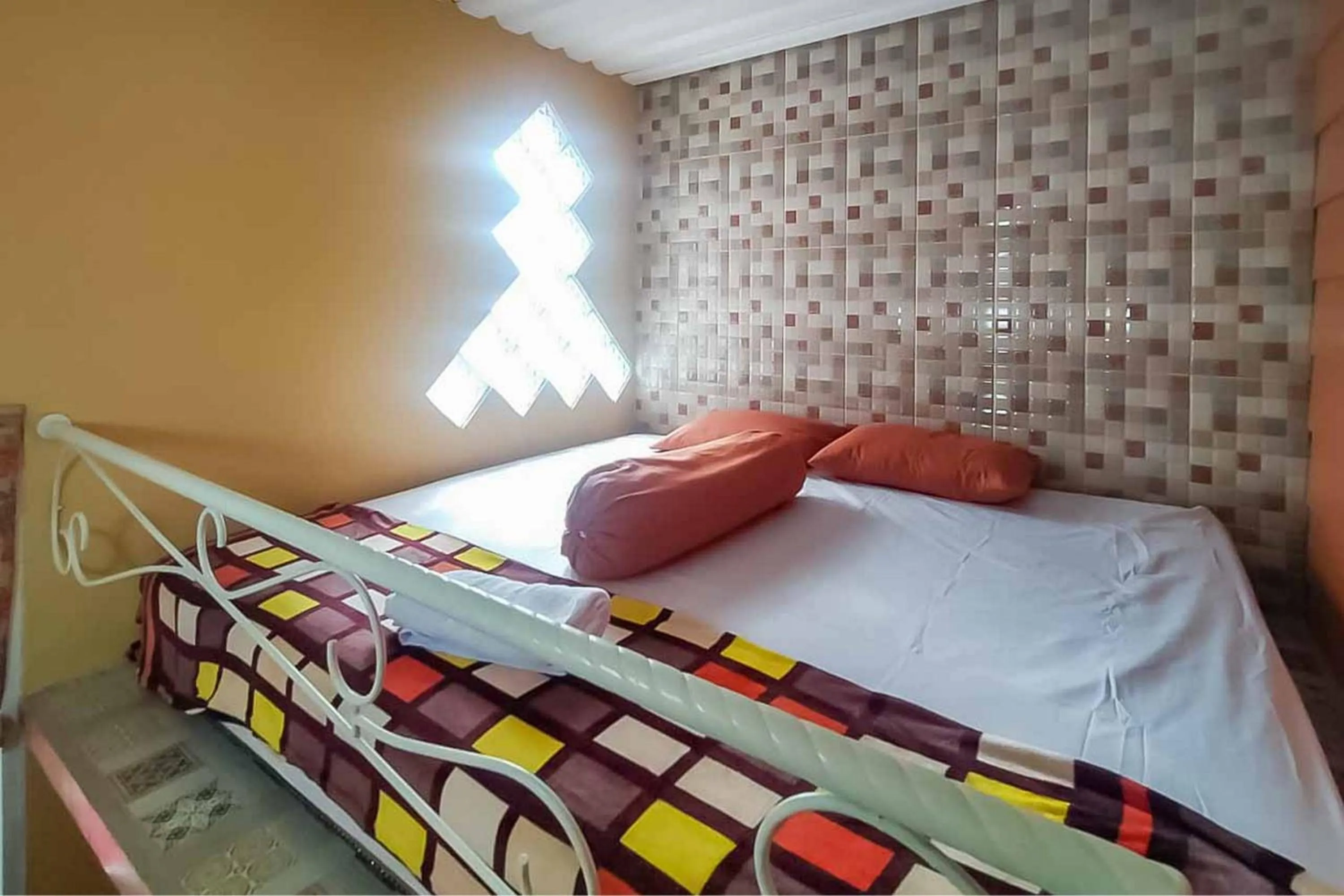 Bed in d'H Mansion La Rosa Syariah Sentul Mitra RedDoorz