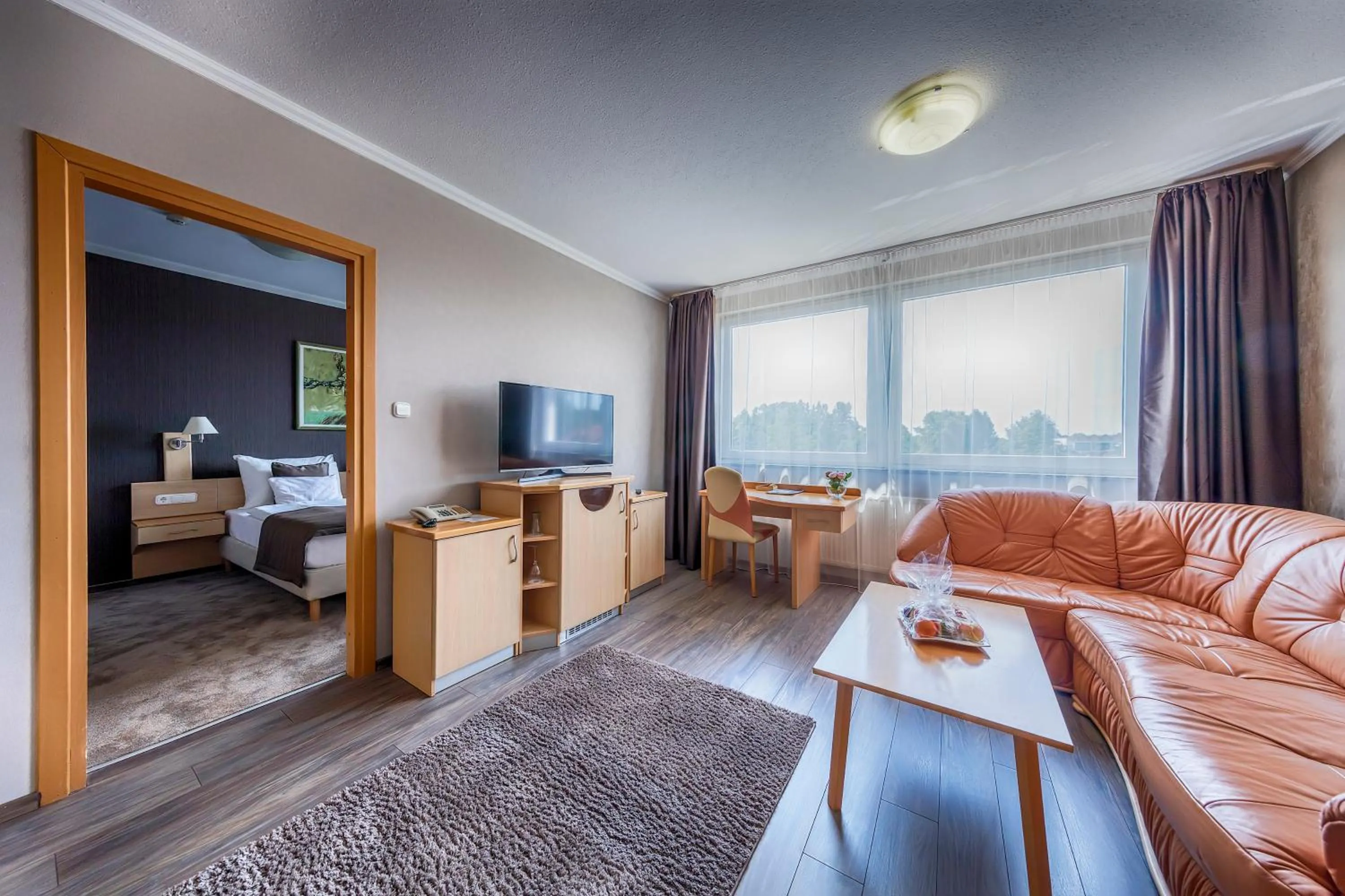 Bed in MenDan Magic Spa & Wellness Hotel