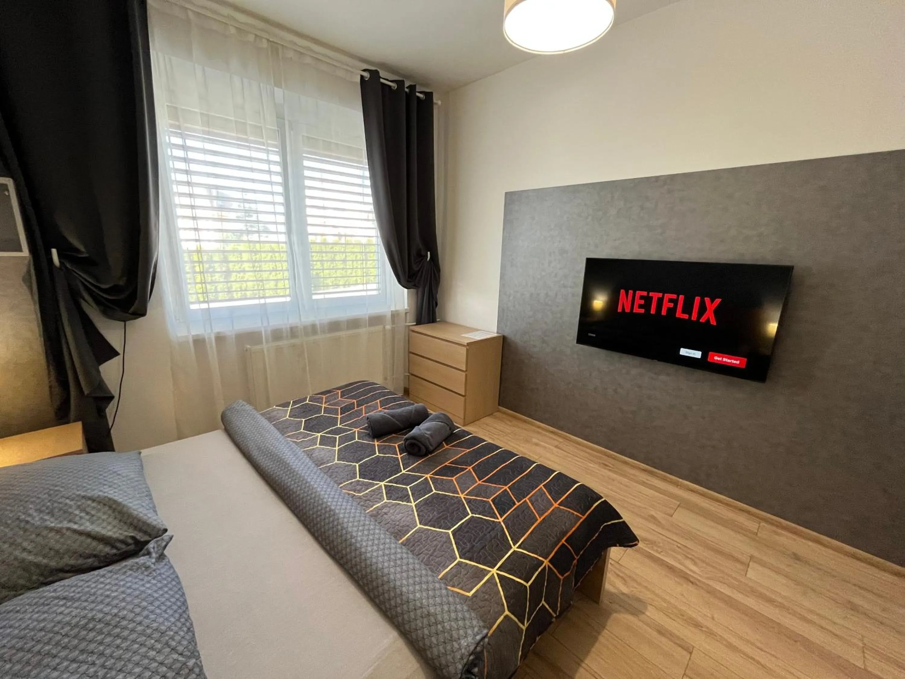 TV and multimedia, Bed in APARTMENTS TRENČÍN -Free Parking-