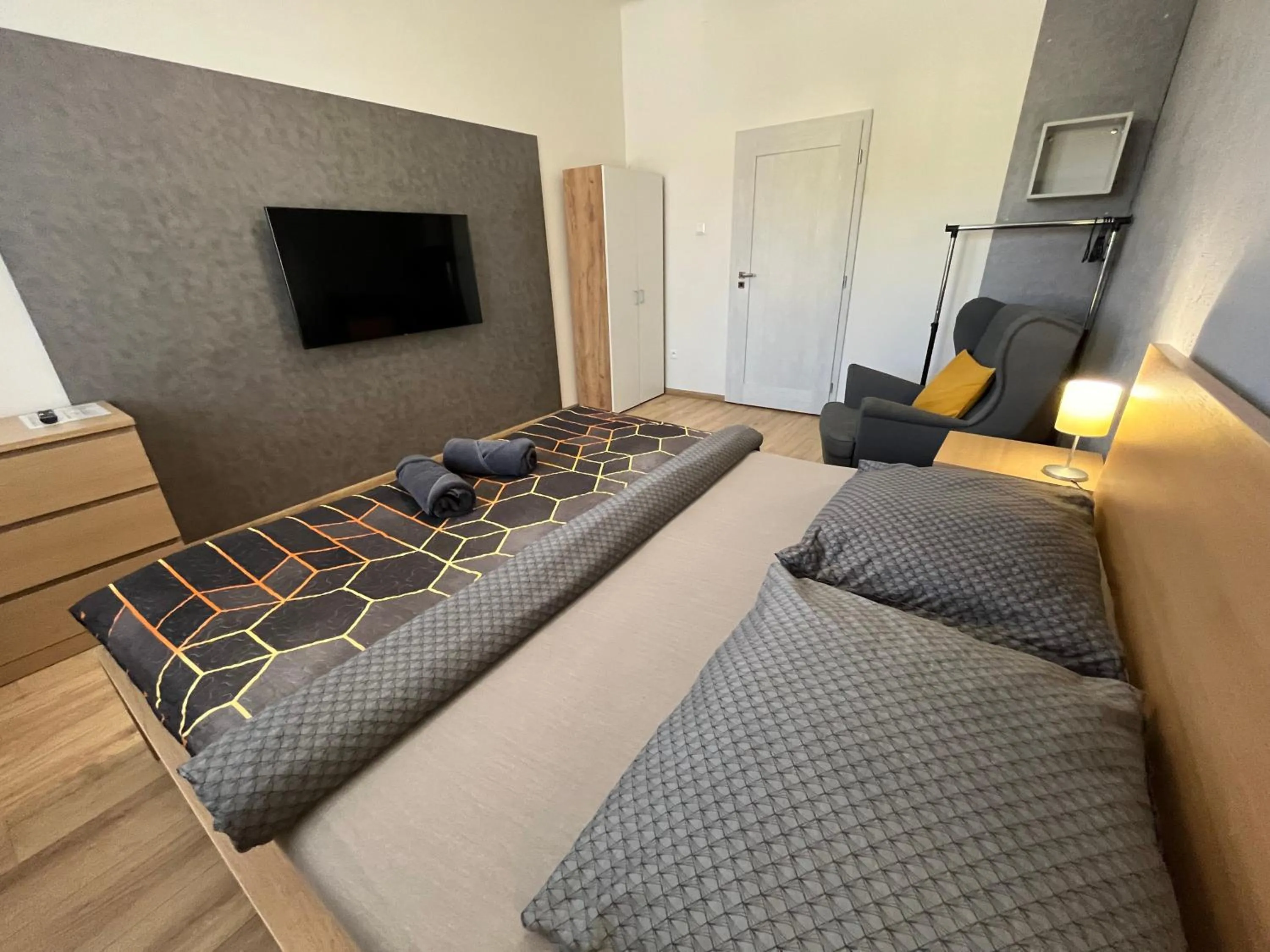 TV and multimedia, Bed in APARTMENTS TRENČÍN -Free Parking-