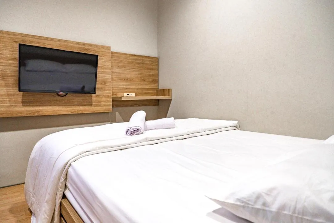 Bed in Three J Residence