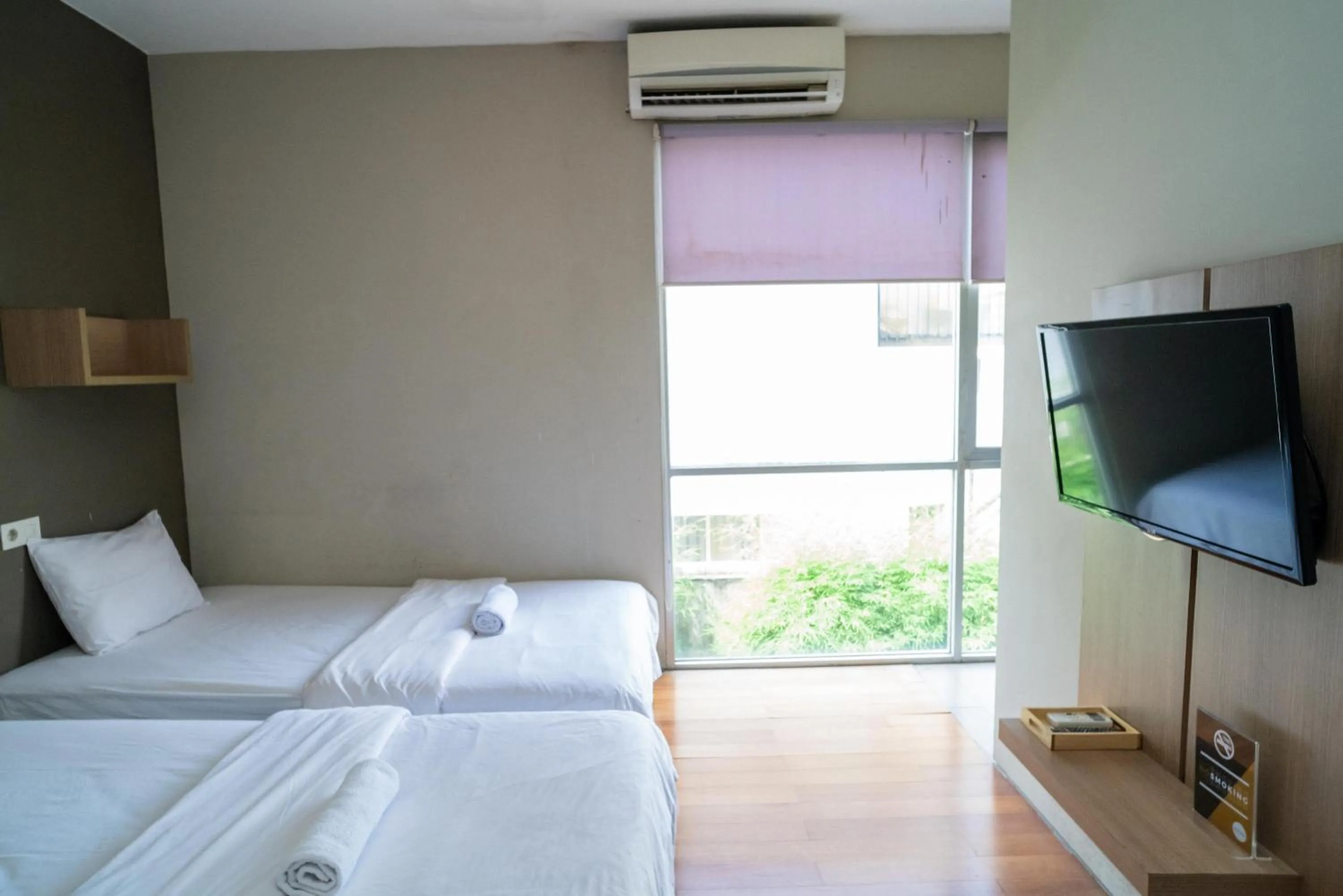 Bed in Three J Residence