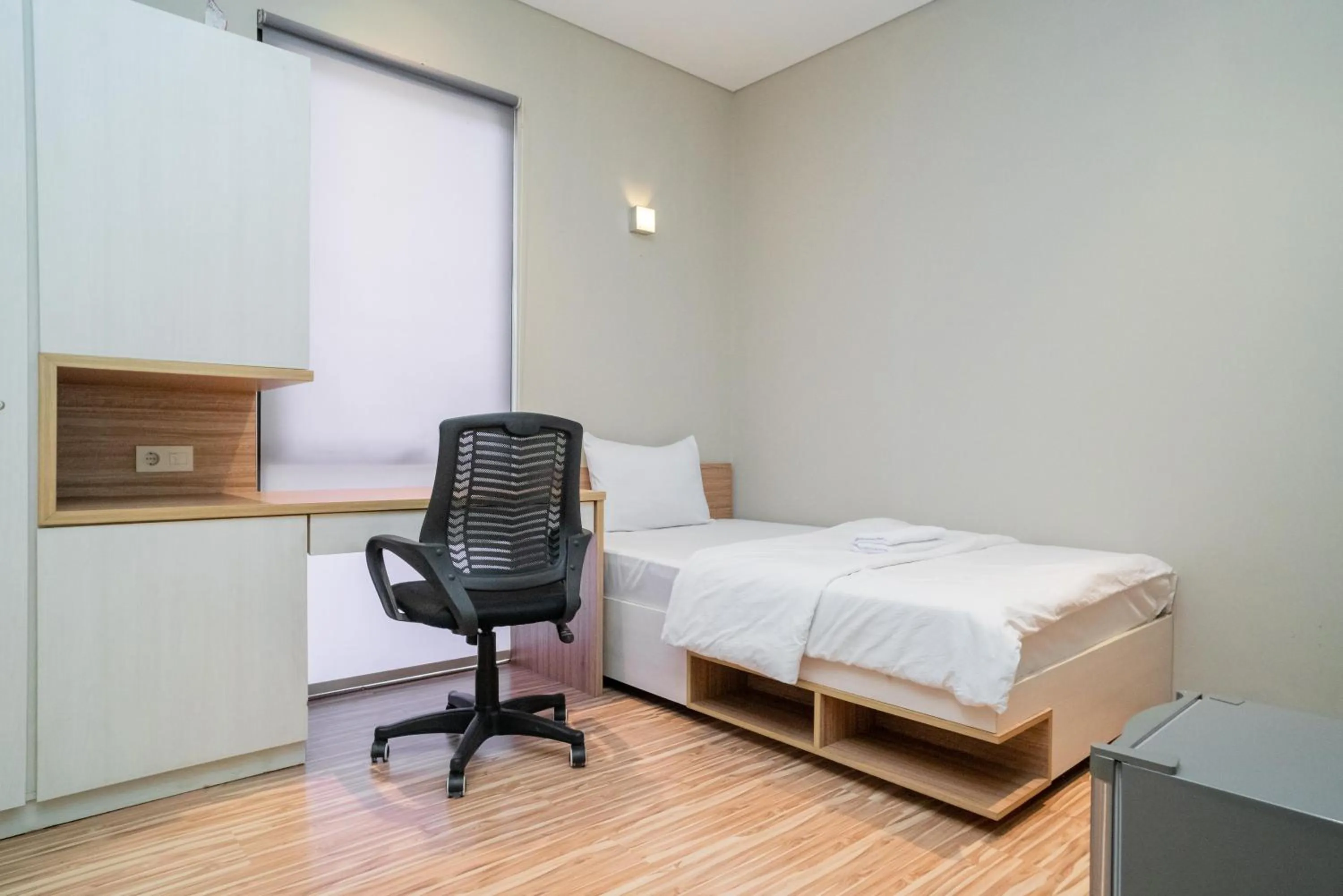 Bed in Three J Residence