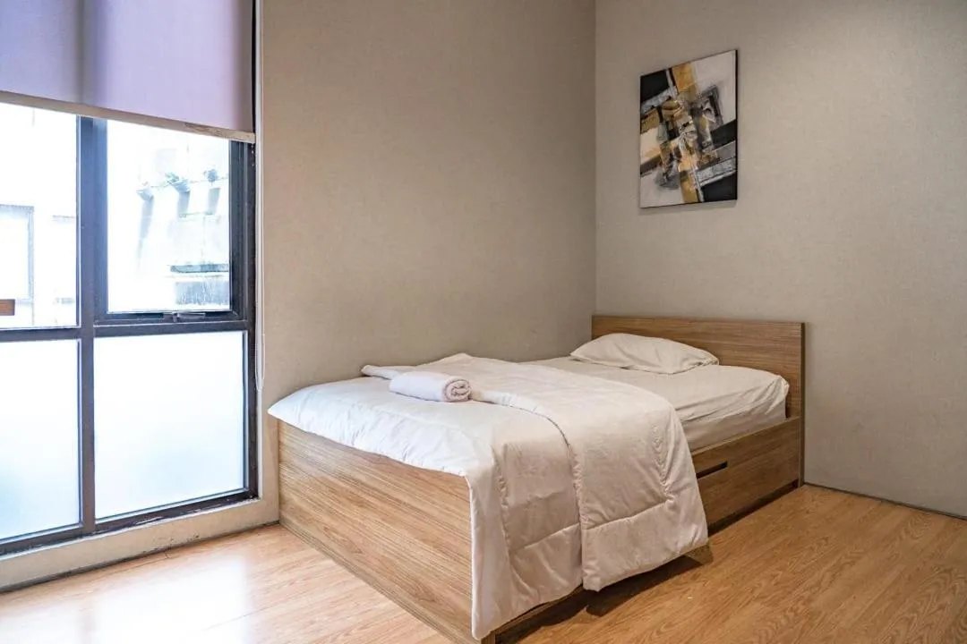 Bed in Three J Residence