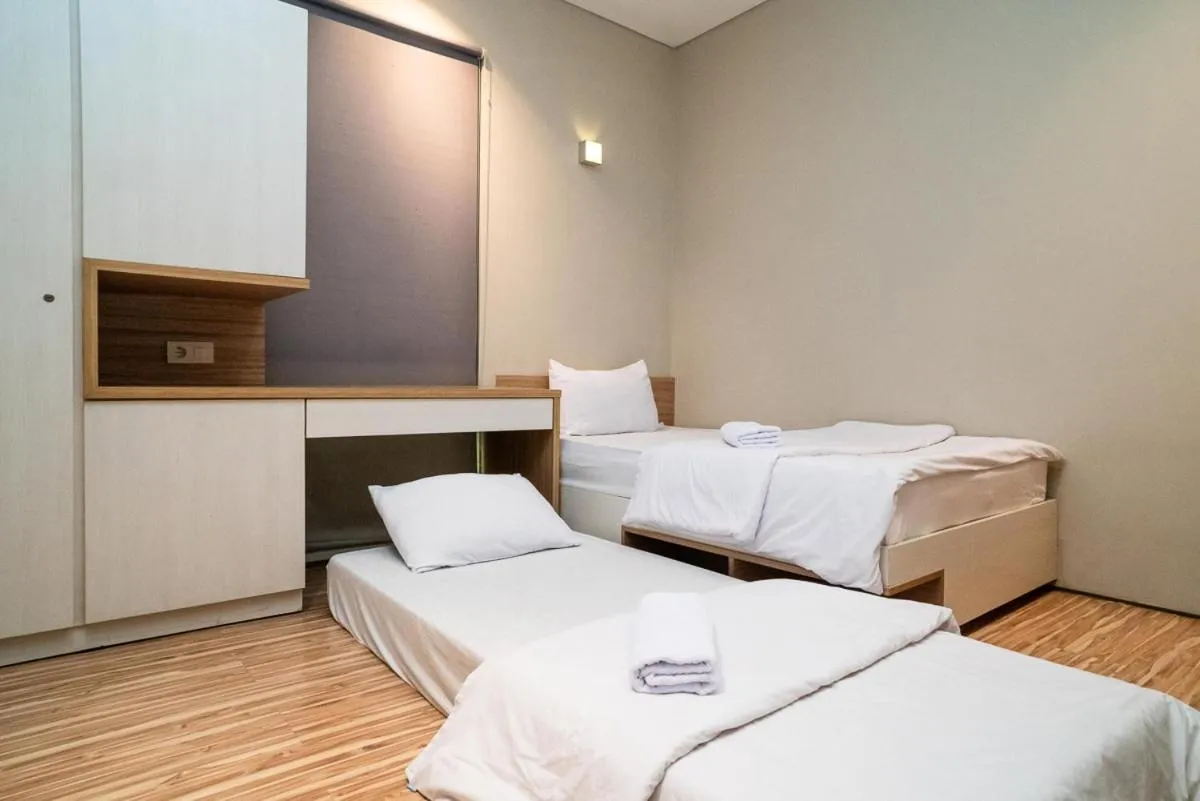 Bed in Three J Residence